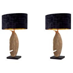 Pair of Table Lamps in Patinated Brass with Black Granite Bases.