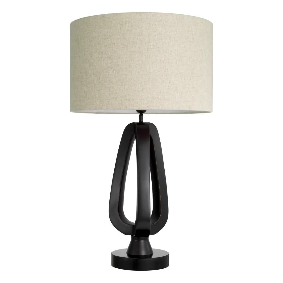 Patiné Paire de lampes de table en bronze patiné avec base en granit noir. en vente