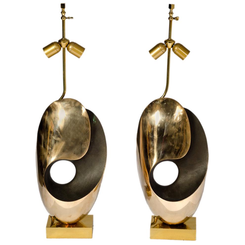 Pair of Table Lamps in sculptural Bronze.