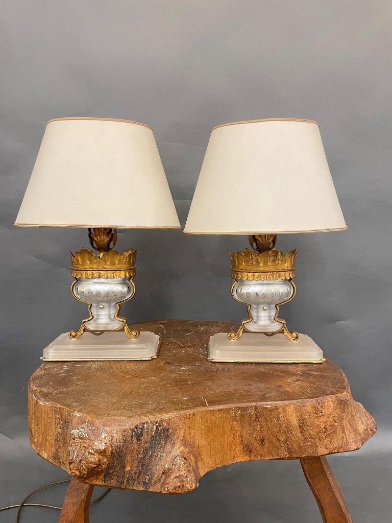 Elegant pair of table lamps in quality crystal and bronze.