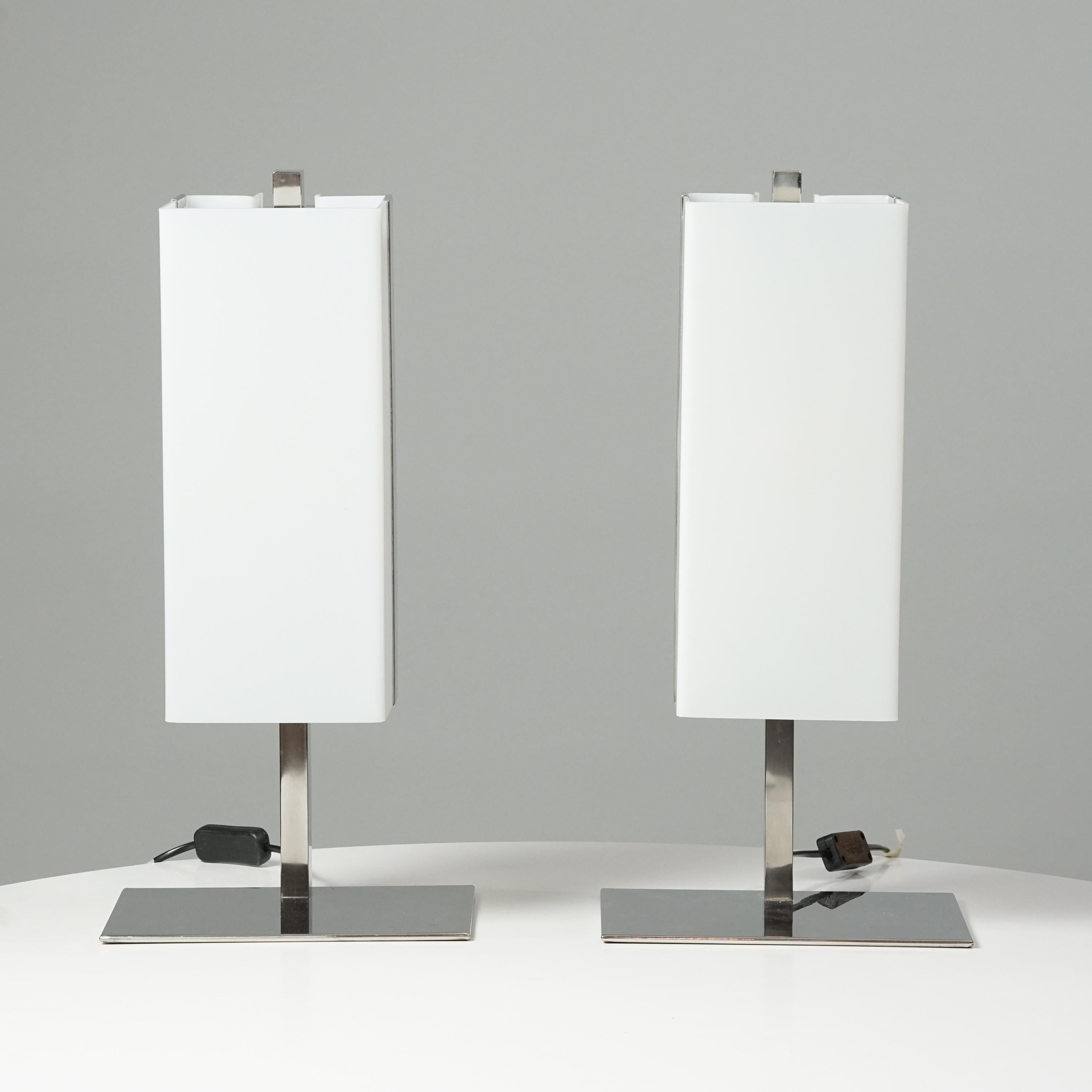 Pair of Table Lamps, designed by Lars-Gunnar Nordström, manufactured by Metallimestarit, 1970s. Marked. Metal frame with acrylic lamp shade. Good vintage condition, minor patina consistent with age and use. The table lamps are sold as a