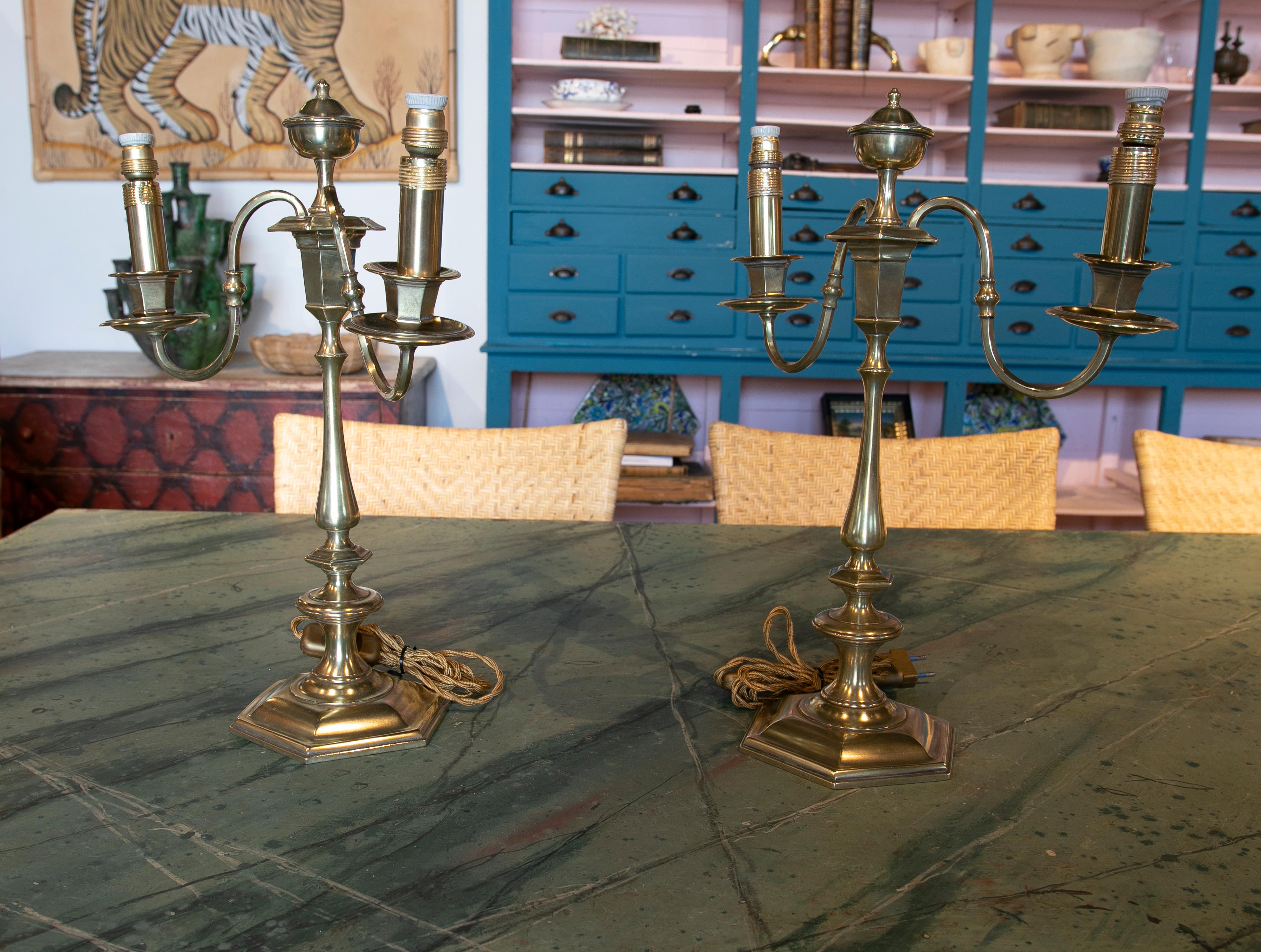 Pair of table lamps made with bronze candlesticks.