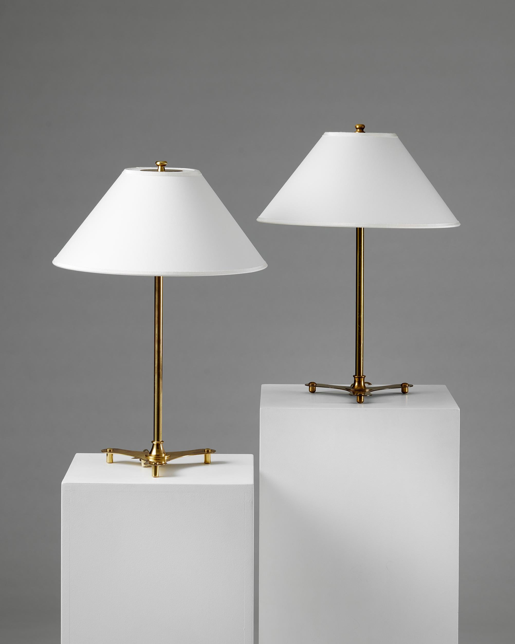 Pair of table lamps model 2552 designed by Josef Frank for Svenskt Tenn, Sweden, 1950s

Stamped.

Brass and textile.

Josef Frank was a true European, he was also a pioneer of what would become classic 20th century Swedish design and the