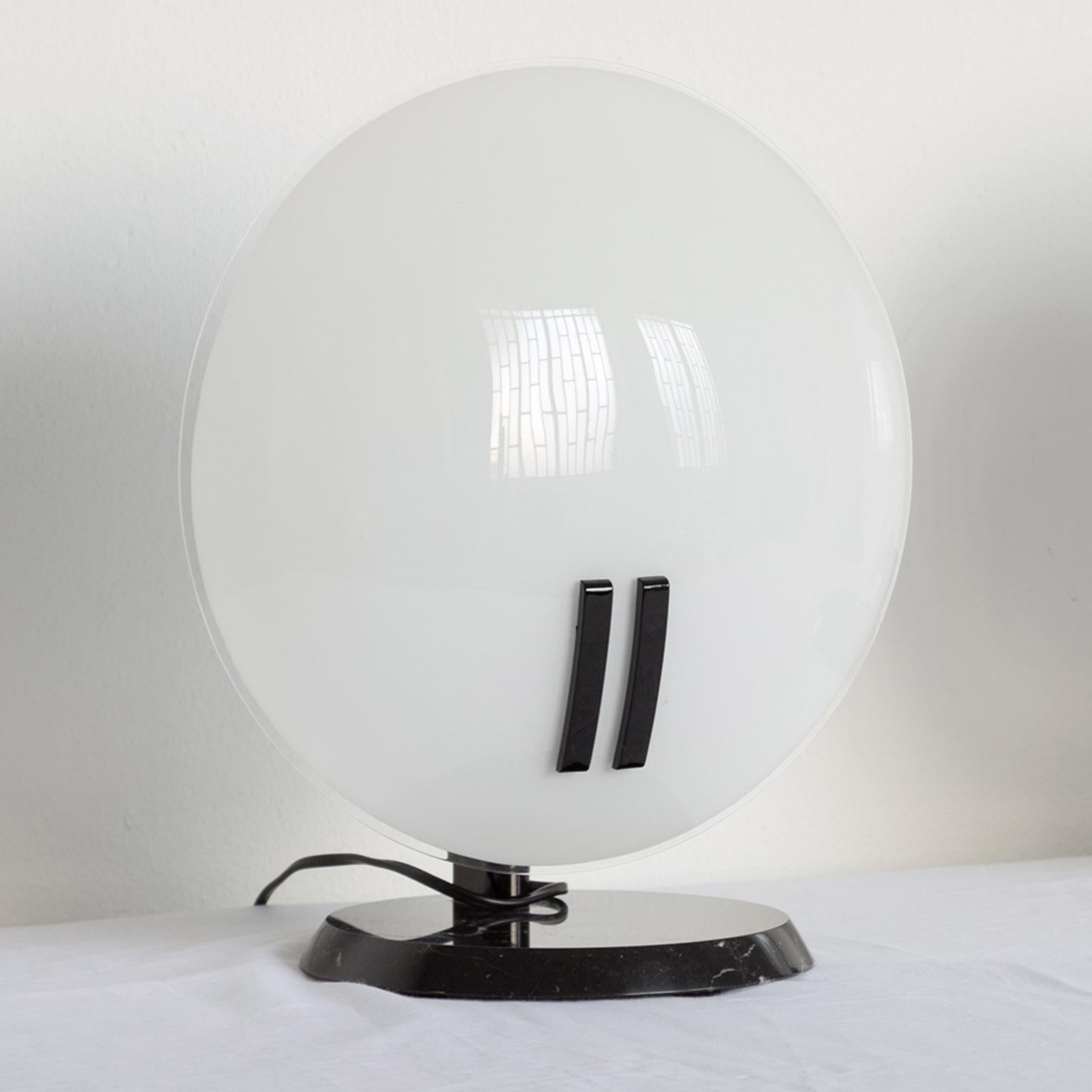 Fully functional pair of large pearl table lamp by Bruno Gecchelin for Oluce, 1980s.

Founded in 1945 by Giuseppe Ostuni, Oluce is the oldest active lighting design company in Italy. Highly influential in the midcentury, Oluce helped pave the way