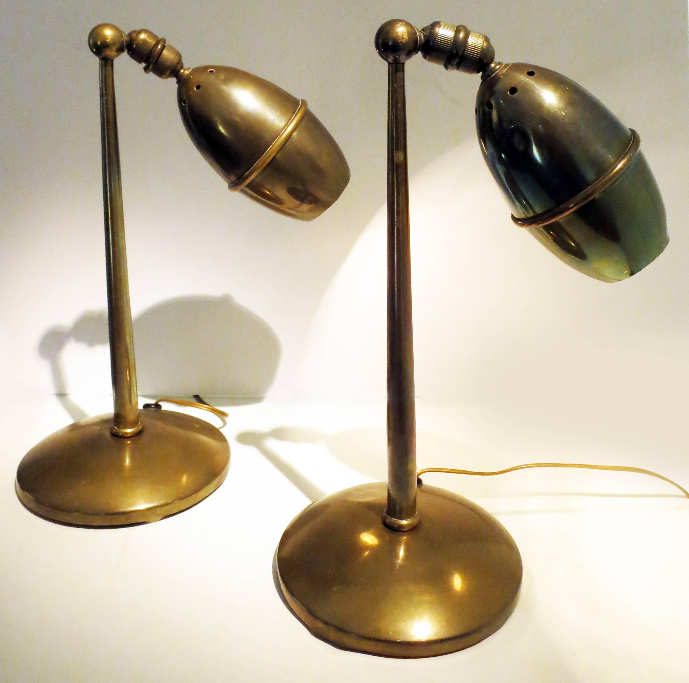 Rare pair of articulated lamps.
Amazing architectural design.
Many positions.
Brass
1950s.