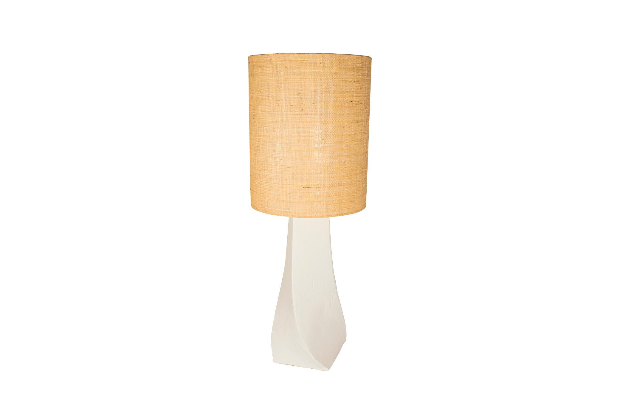 Pair of table lamps,
White plaster lamp feet with twisted decoration,
Rattan lampsdade,
France, circa 1970.

Measures: Height 112 cm, diameter 42 cm.