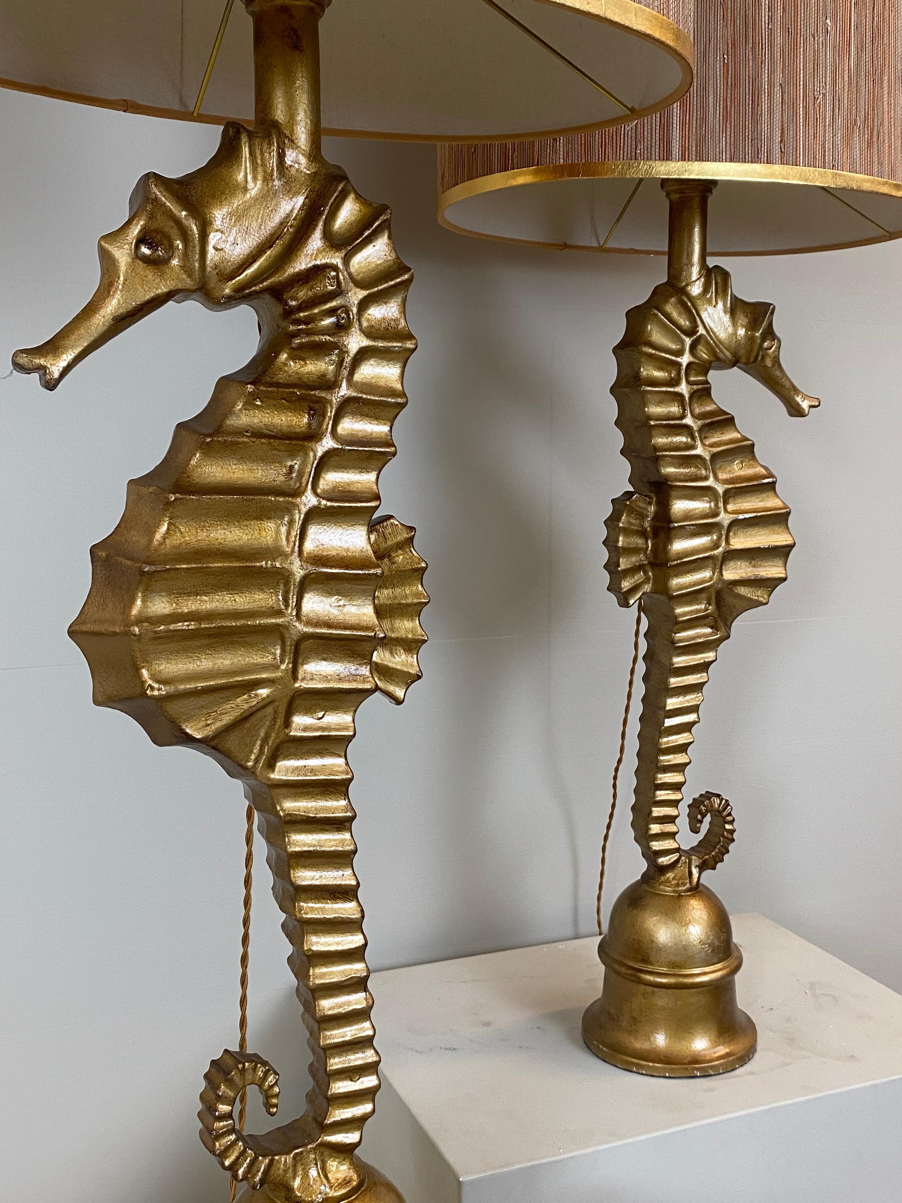 Polished Pair of Art Deco style vintage metallic seahorse table lamps. France, 1970s.