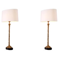 Pair of Table Lamps, with a Patinated Brass Finish and Black Granite Base.