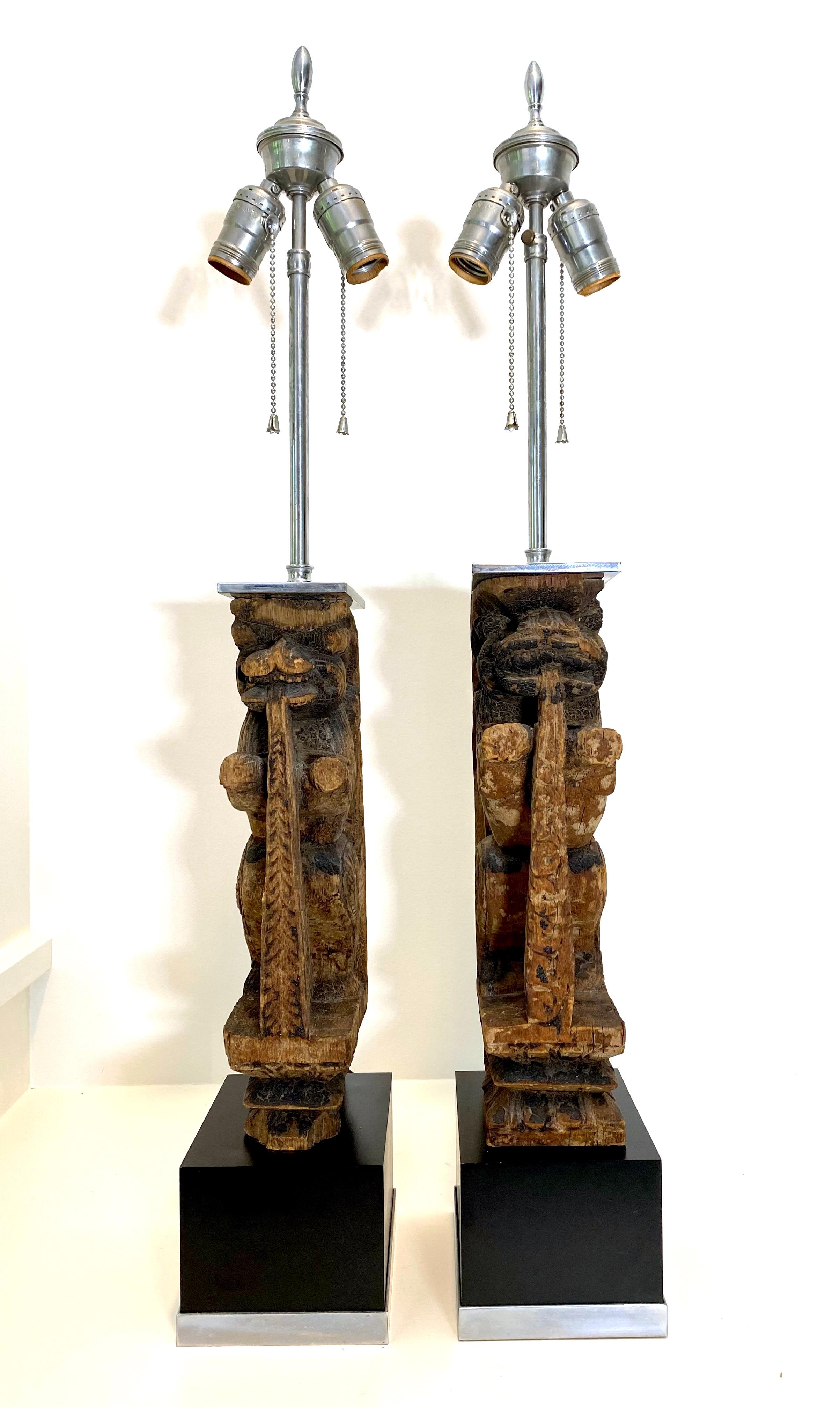 Central Asian Pair of Table Lamps with Hand Carved Temple Lions Mounted in Nickel For Sale