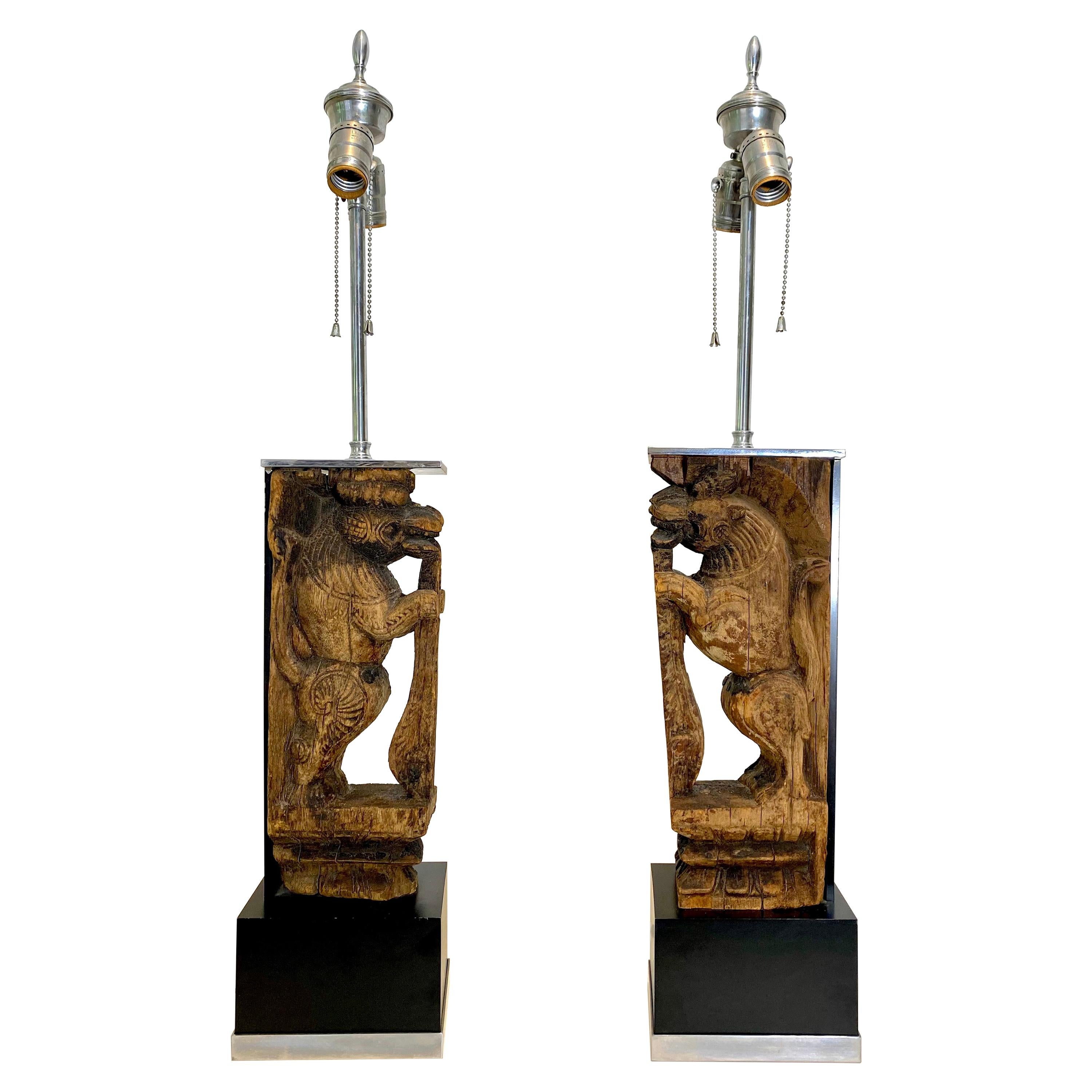 Pair of Table Lamps with Hand Carved Temple Lions Mounted in Nickel