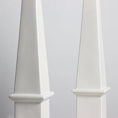 Pair of table lamps with white glazed ceramic frames and gilt brass details