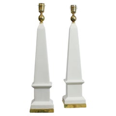 Pair of table lamps with white glazed ceramic frames and gilt brass details