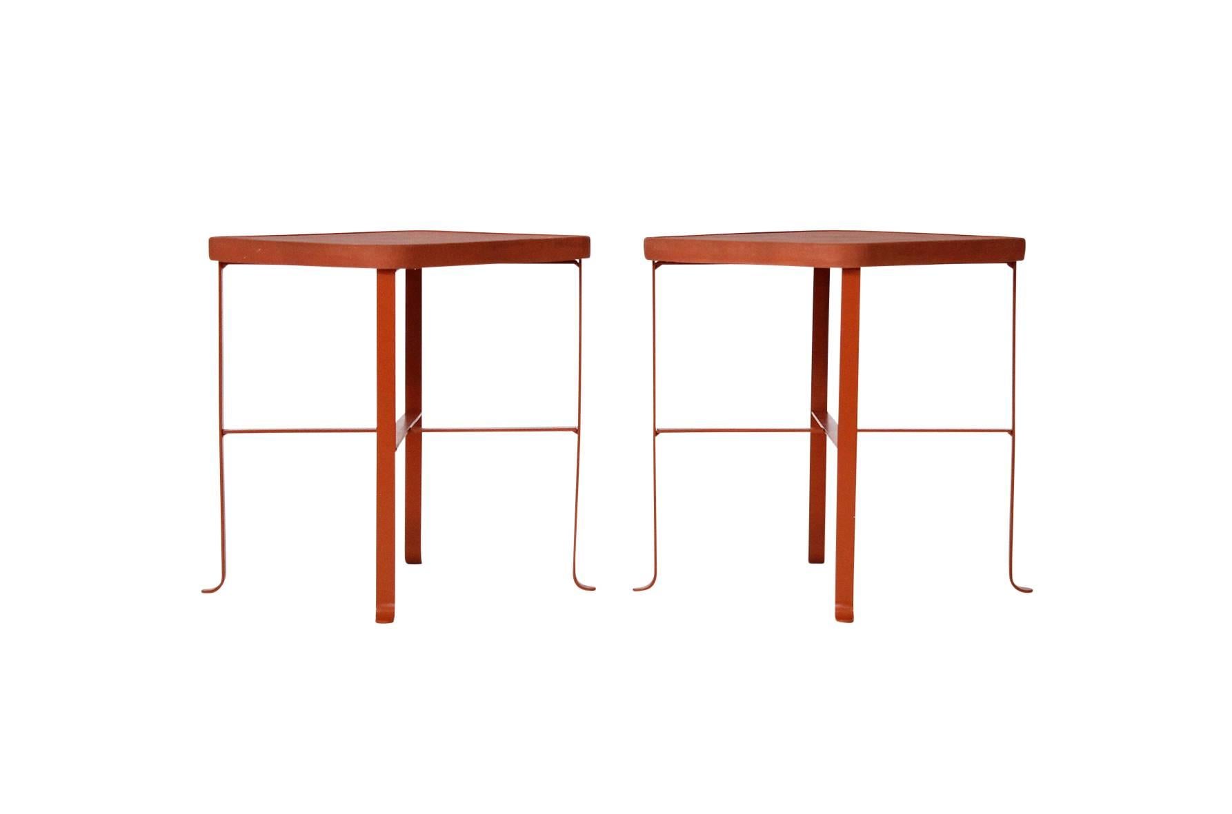 Rare pair of orange ceramic and metal tables by the Vermont based Bennington Potters.