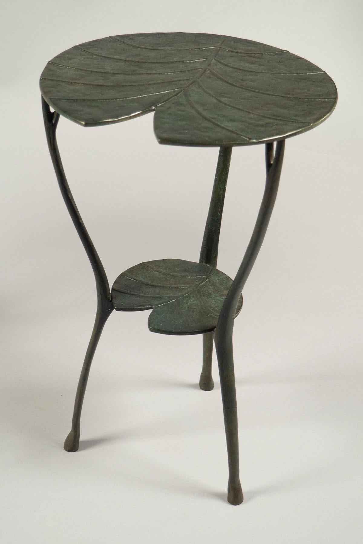 Cast bronze two-tier tables with their surfaces in the shape of water lilies, finished a dark green patina. Limited editions 3+4/99.
Custom sizes and finishes available.