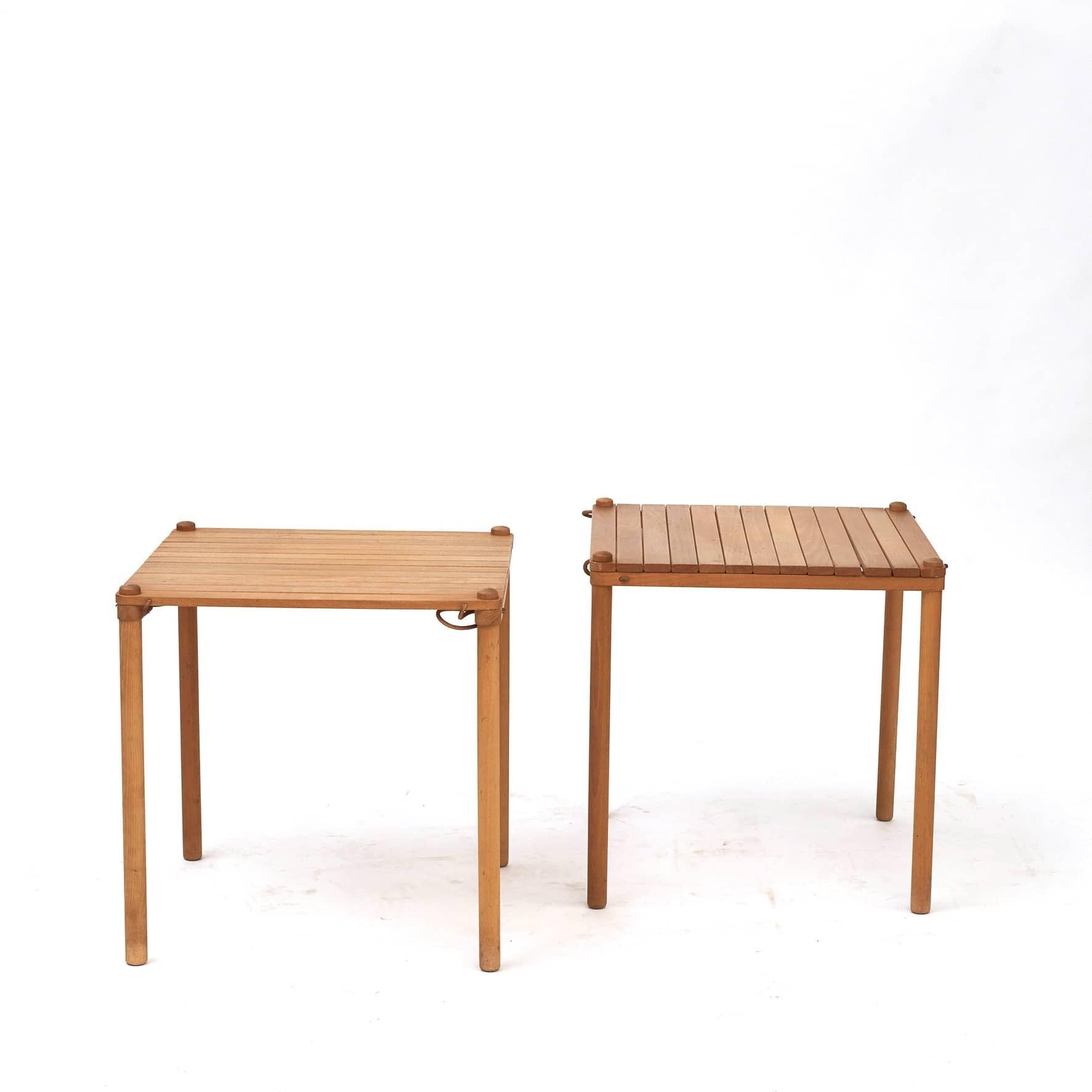 Axel Thygesen (1927-1976), architect and furniture designer.
Pair of tables, model at-54, designed by Axel Thygesen.
Made from beech with leather strings.
Easy to disassemble / assemble.

Manufactured by Interna, 1965.
Original untouched