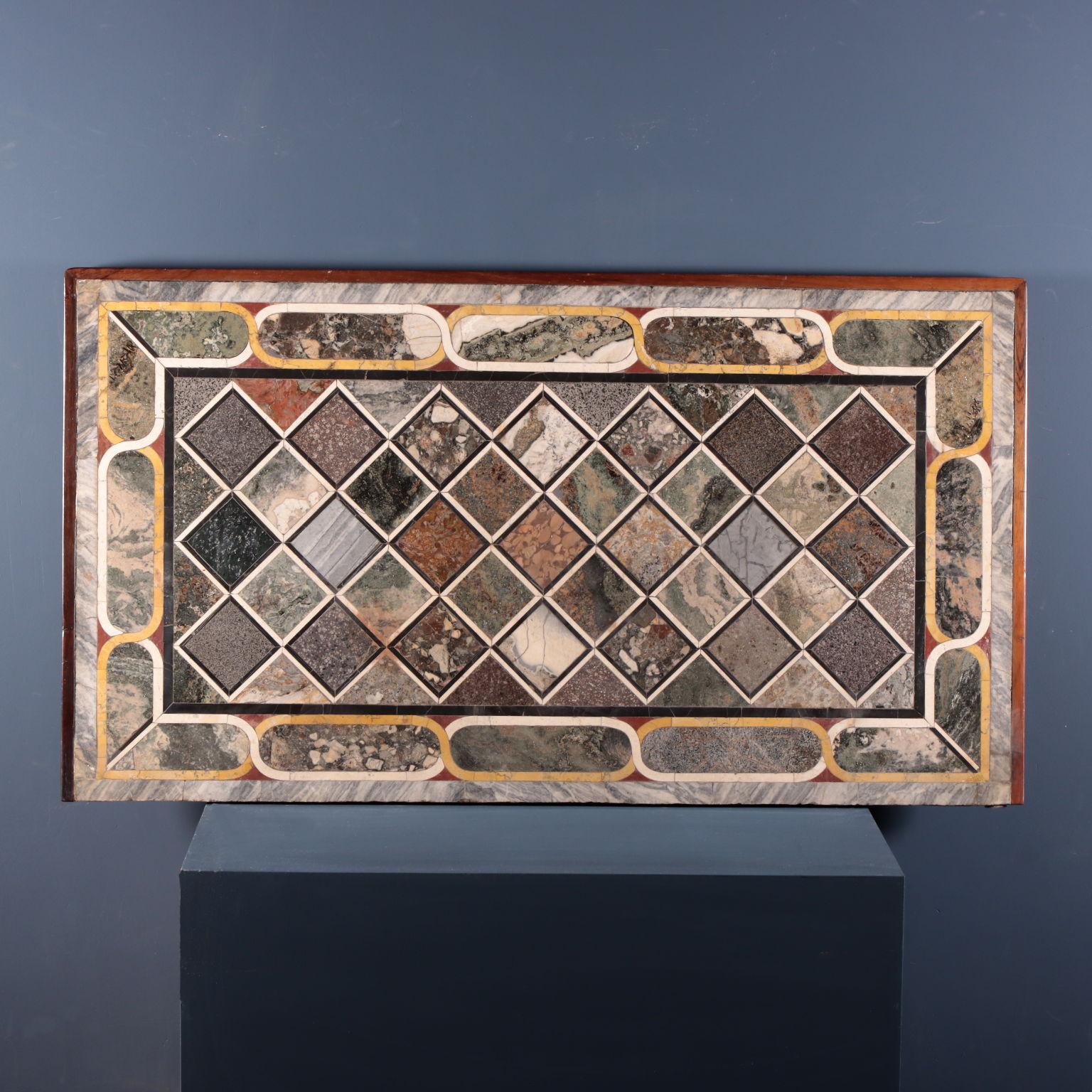 Pair of tables with tops in lava stone and marble, second half of the 18th century, attributed to Tommaso (Rome 1725-Naples 1780) and Mattia (Rome 1746-Naples?) Valenziani. A selected sample of lava stones is arranged on the top; in the border