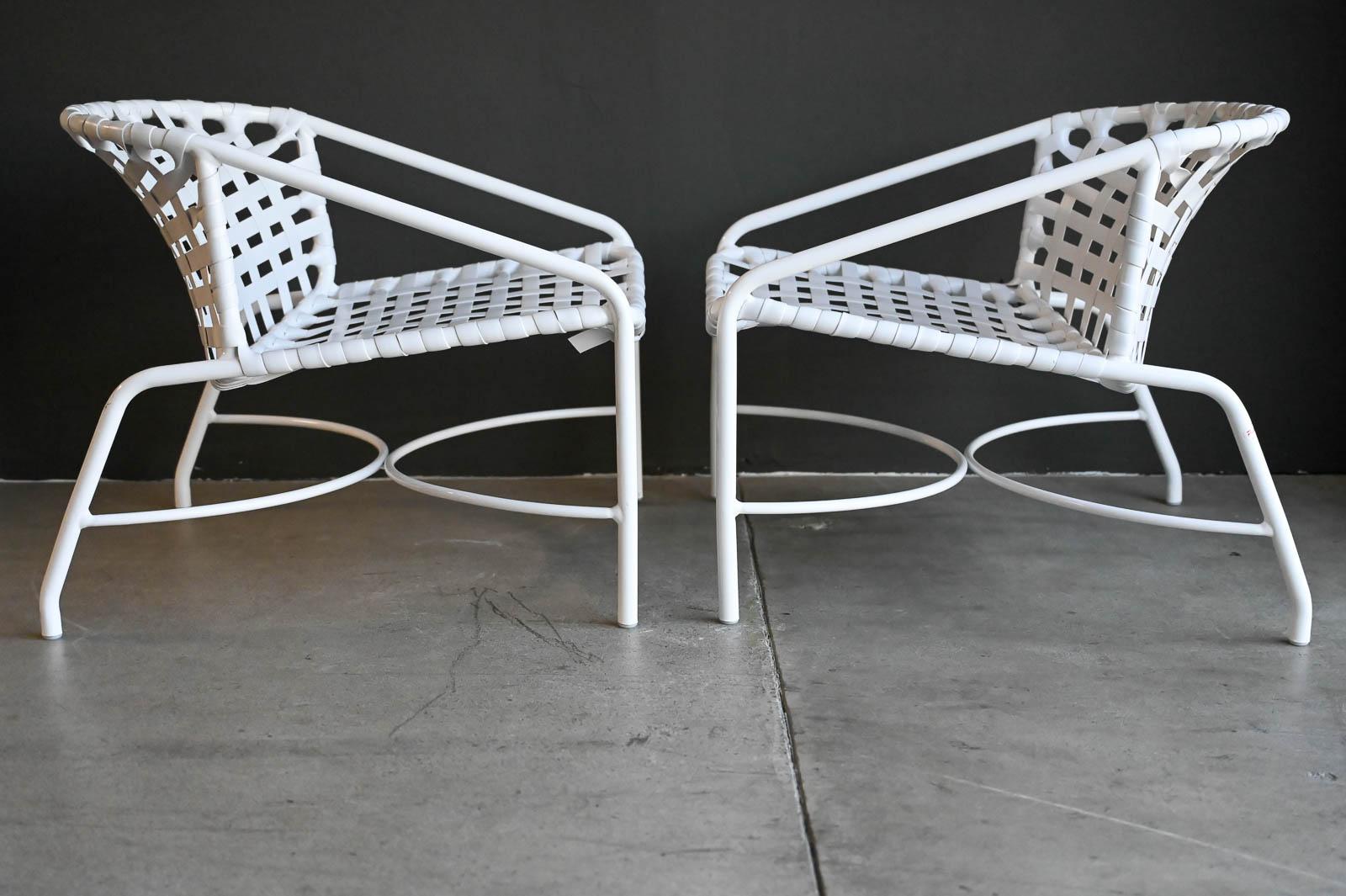Pair of Tadao Inouye for Brown Jordan Kantan Lounge Chairs, ca. 1960.  Beautiful pair of low lounge chairs by Tadao Inouye for Brown Jordan.  Professionally restored newly powder coated frames and new strapping make these beautiful chairs better