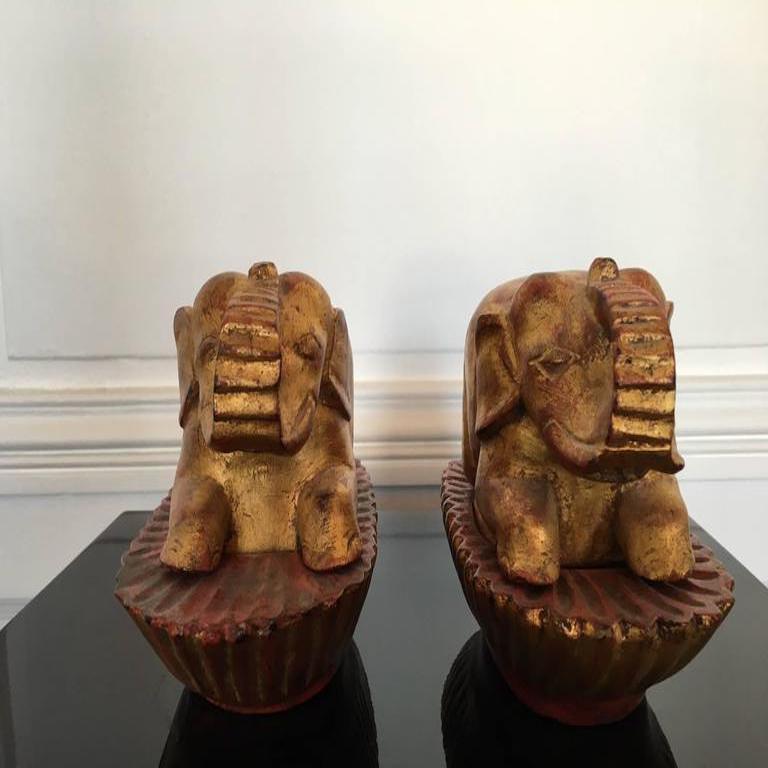 A pair of Taï boxes representing two elephants in giltwood.