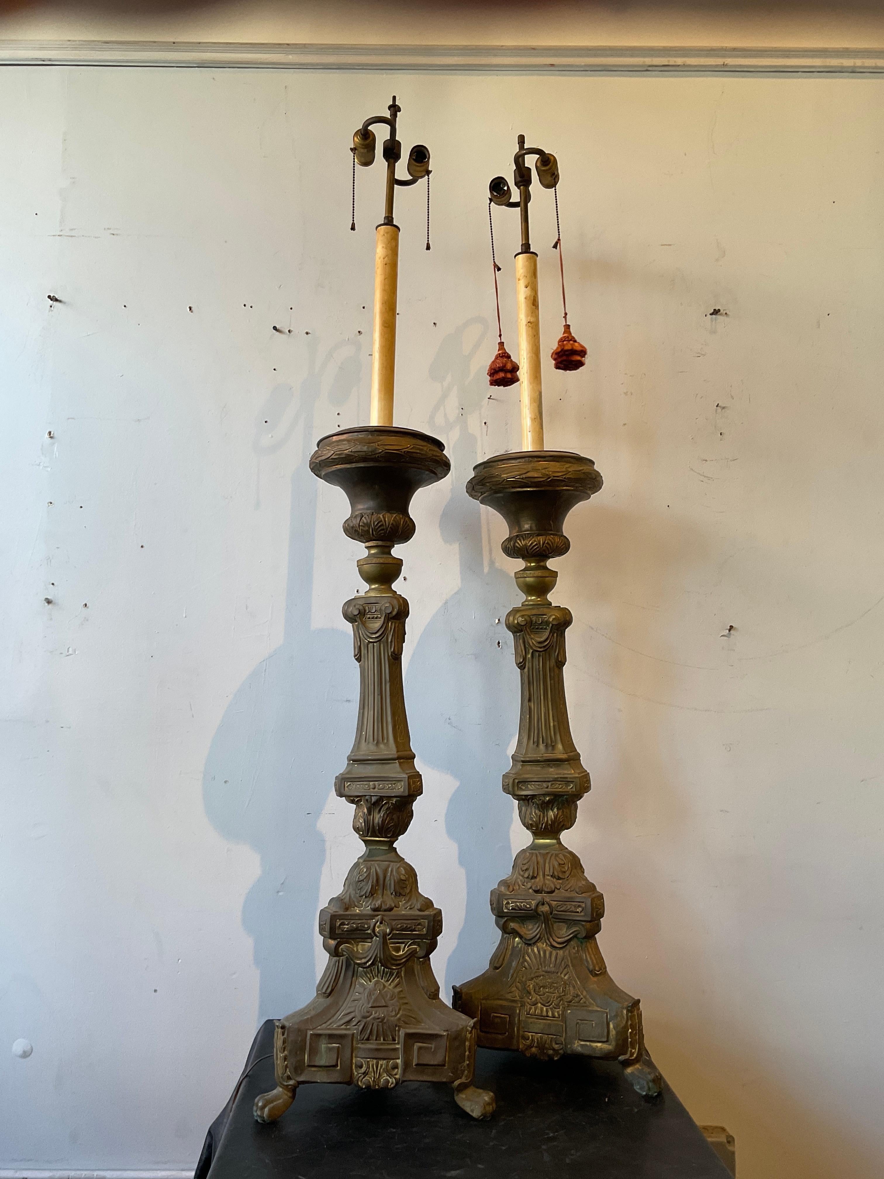 Pair of 1870s tall brass church candlestick lamps.