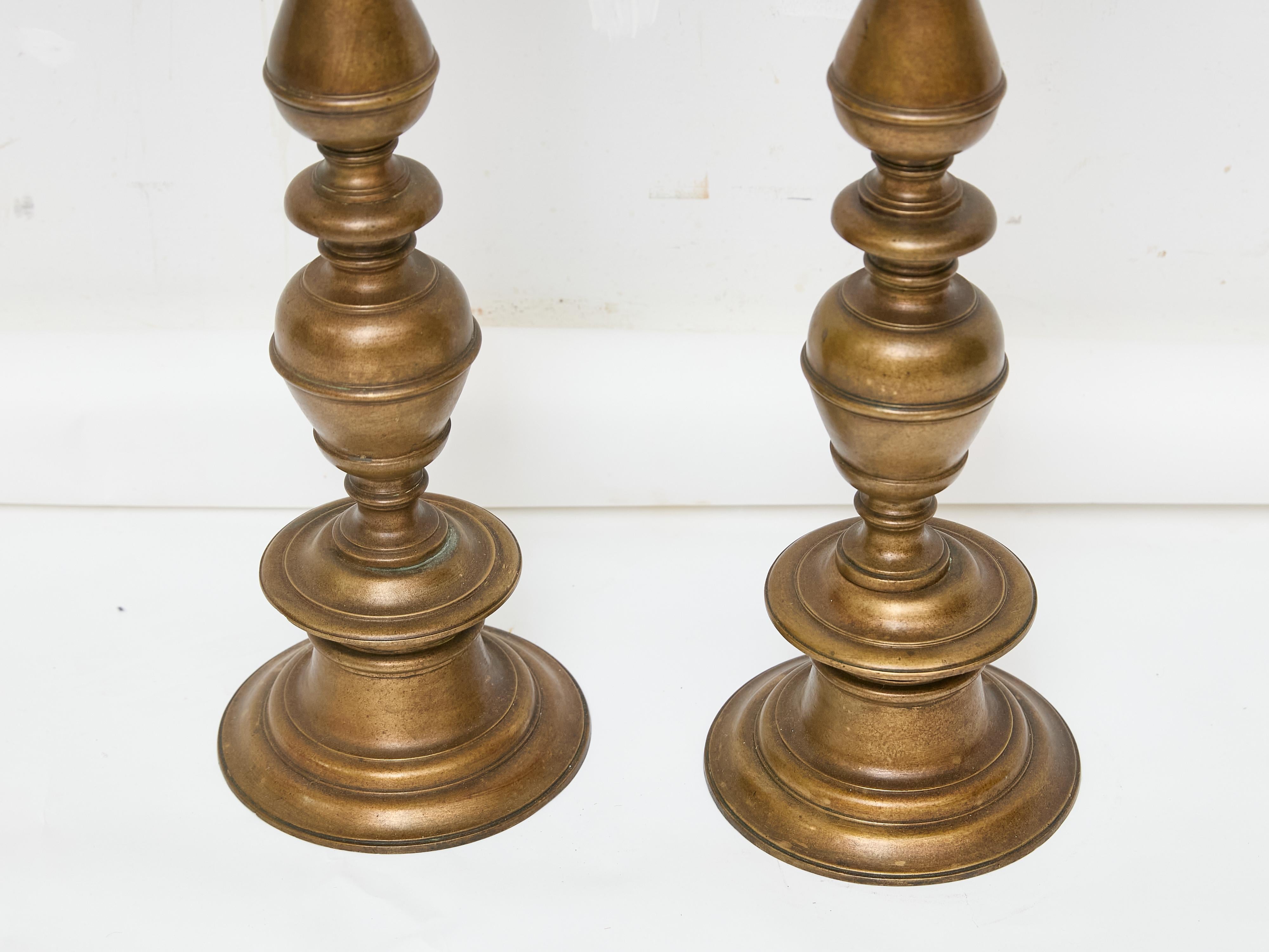 Cast Pair of Tall 18th Century Italian Bronze Pricket Candlesticks For Sale