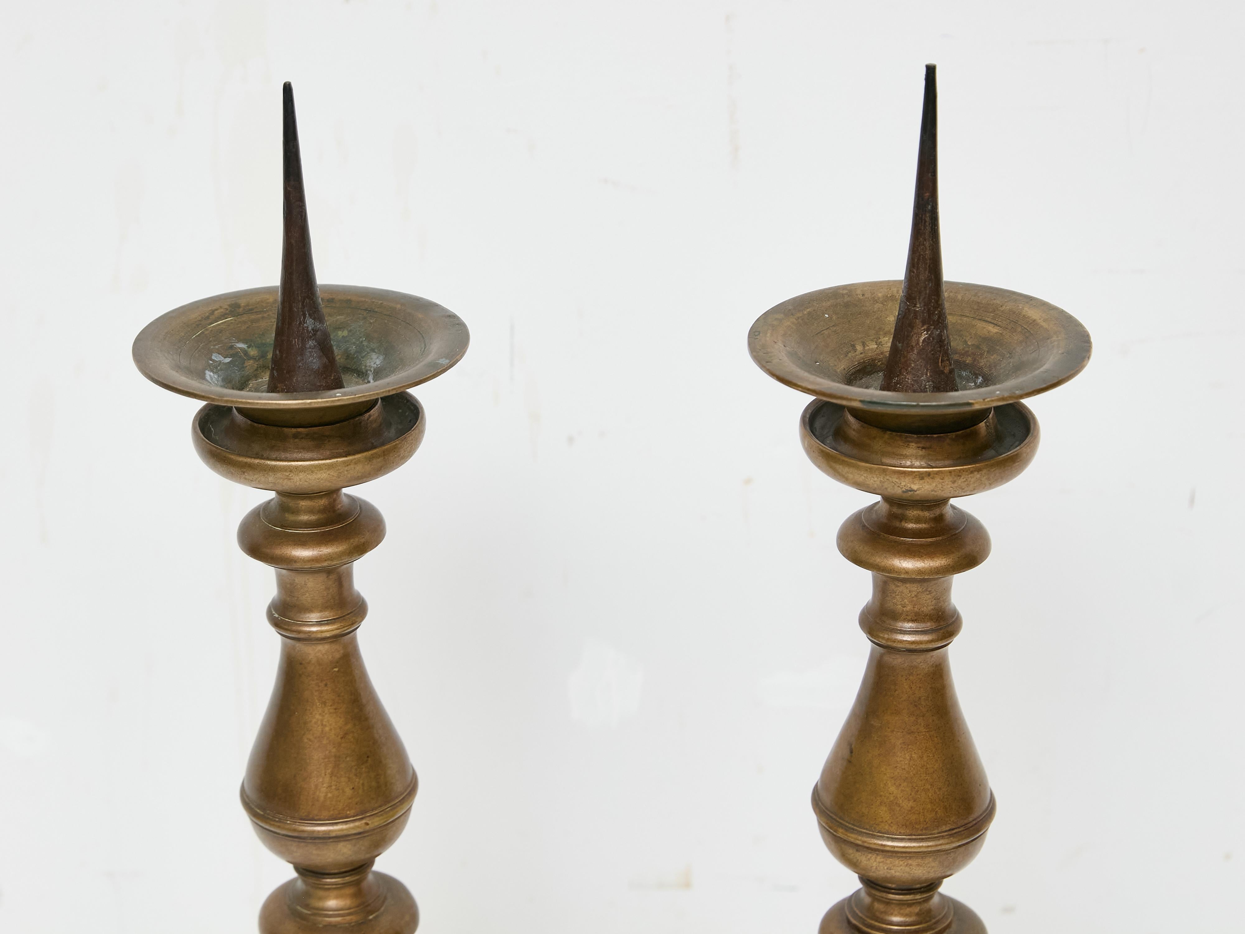 Pair of Tall 18th Century Italian Bronze Pricket Candlesticks In Good Condition For Sale In Atlanta, GA