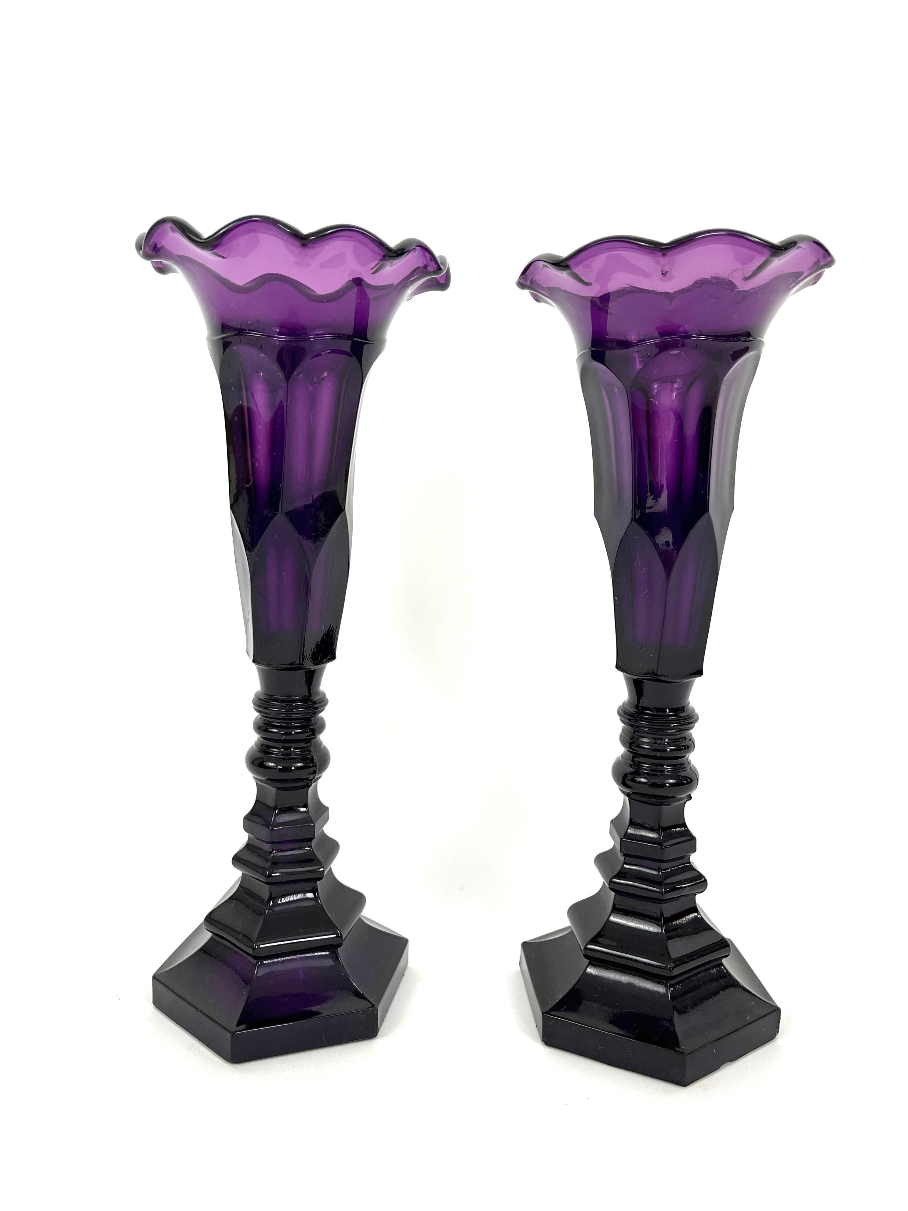 A pair of tall 19th century American blown and molded amethyst glass vases, made by the Boston & Sandwich Glass Company, Sandwich, Massachusetts, circa
1840-1860. Beautiful jewel tone color and great scale.

  