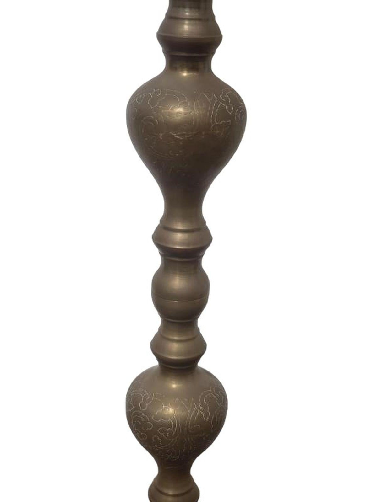 Pair of Tall Brass Candles Sticks measures approx. 49 high x 9.5 diameter each
