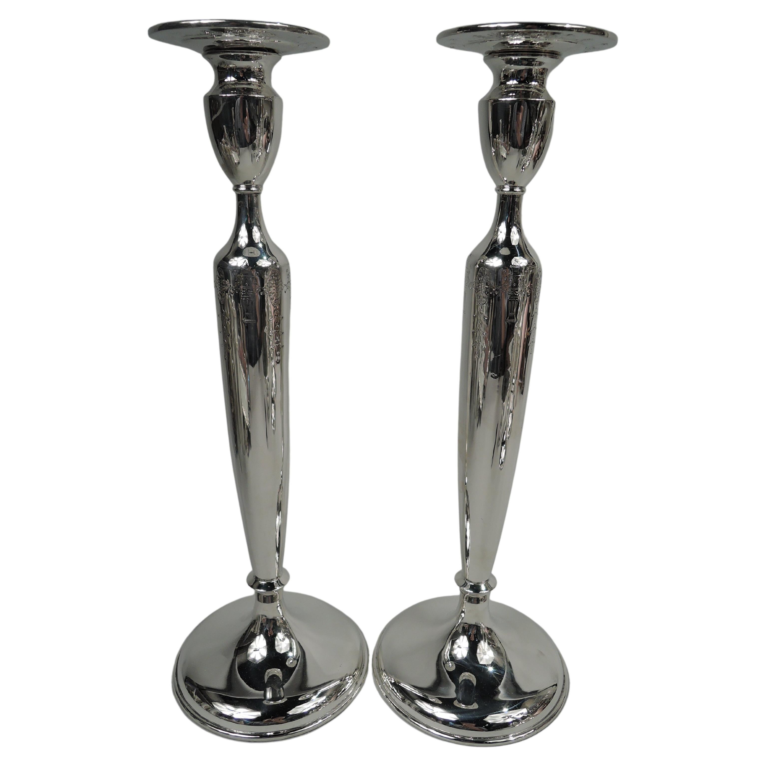 Pair of Tall American Edwardian Classical Sterling Silver Candlesticks For Sale