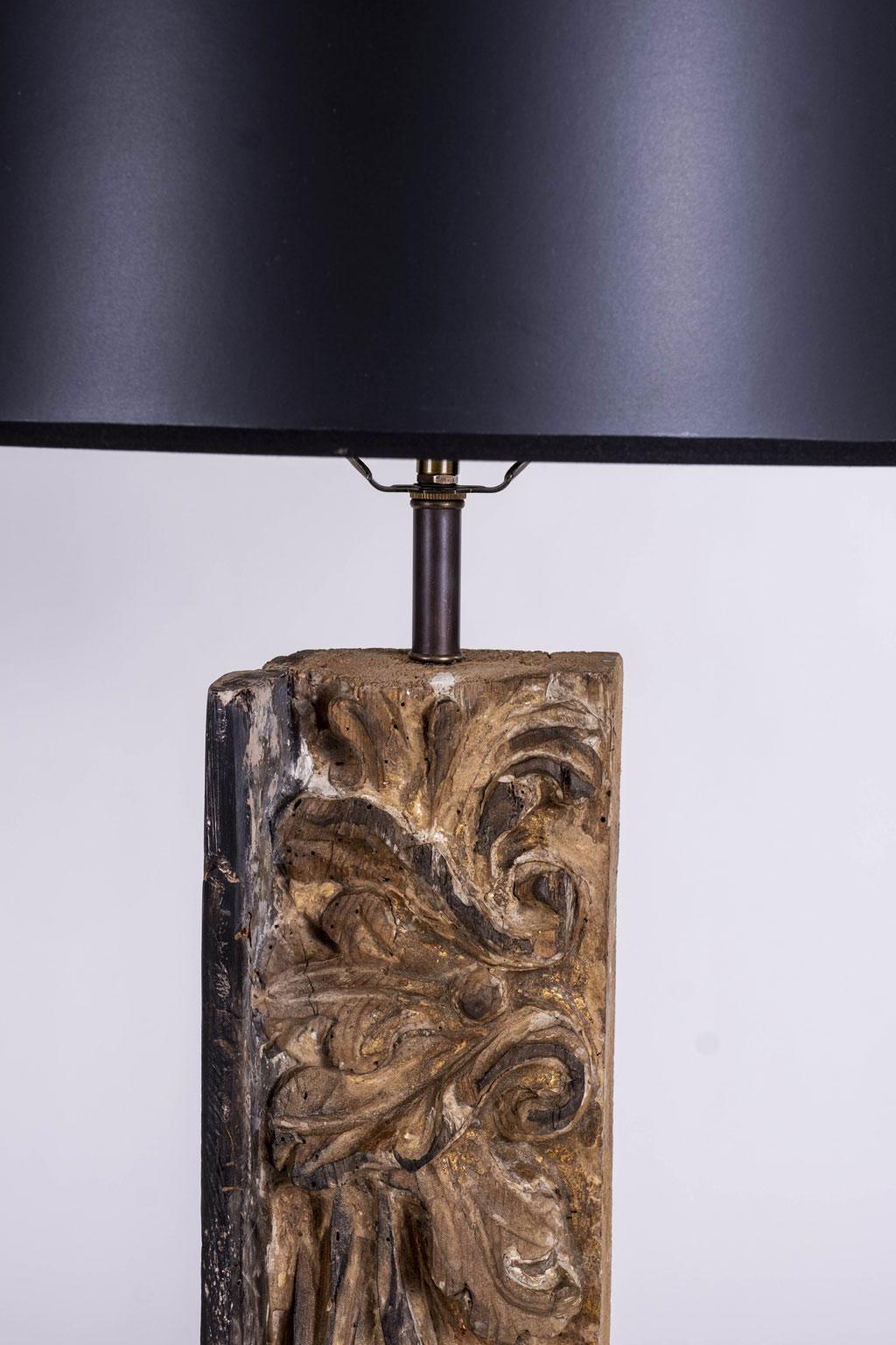 Pair of large architectural fragment lamps. Custom table lamps, newly created from Italian 18th century hand carved giltwood architectural fragments. Each fragment mounted upon a custom base and newly wired for use within the USA using UL listed