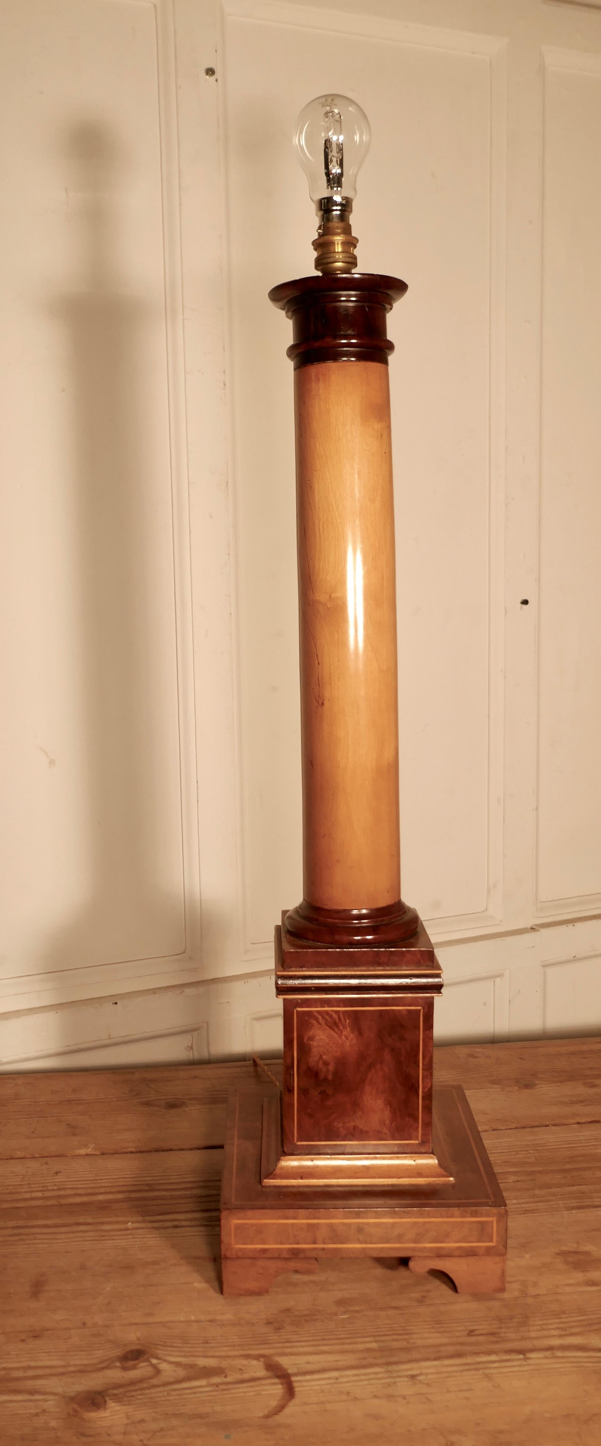 Pair of tall Art Deco maple and walnut column table lamps

These are a very stylish near pair of Corinthian column Art Deco lamps
The lamps vary very slightly in the colours of the woods used, the main columns are in maple and the bases are made