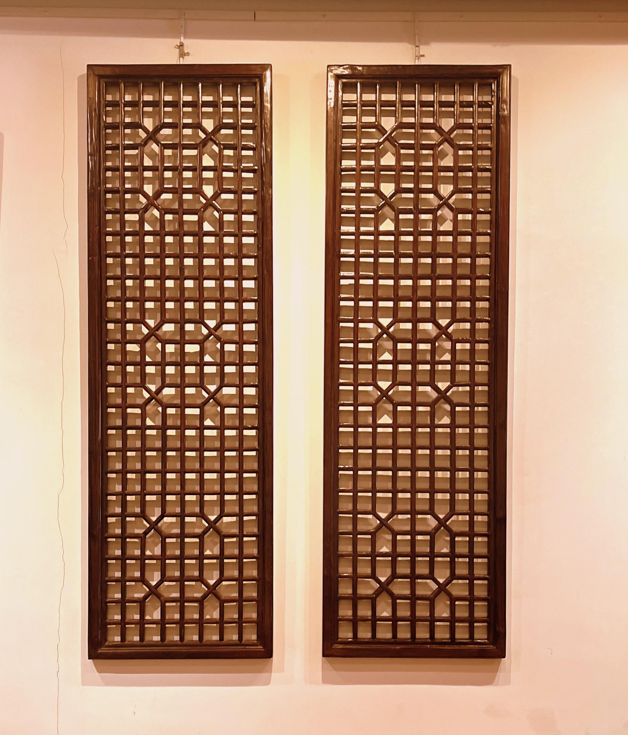 Pair of Asian window panels with geometric shapes design.
All constructed with joinery techniques.