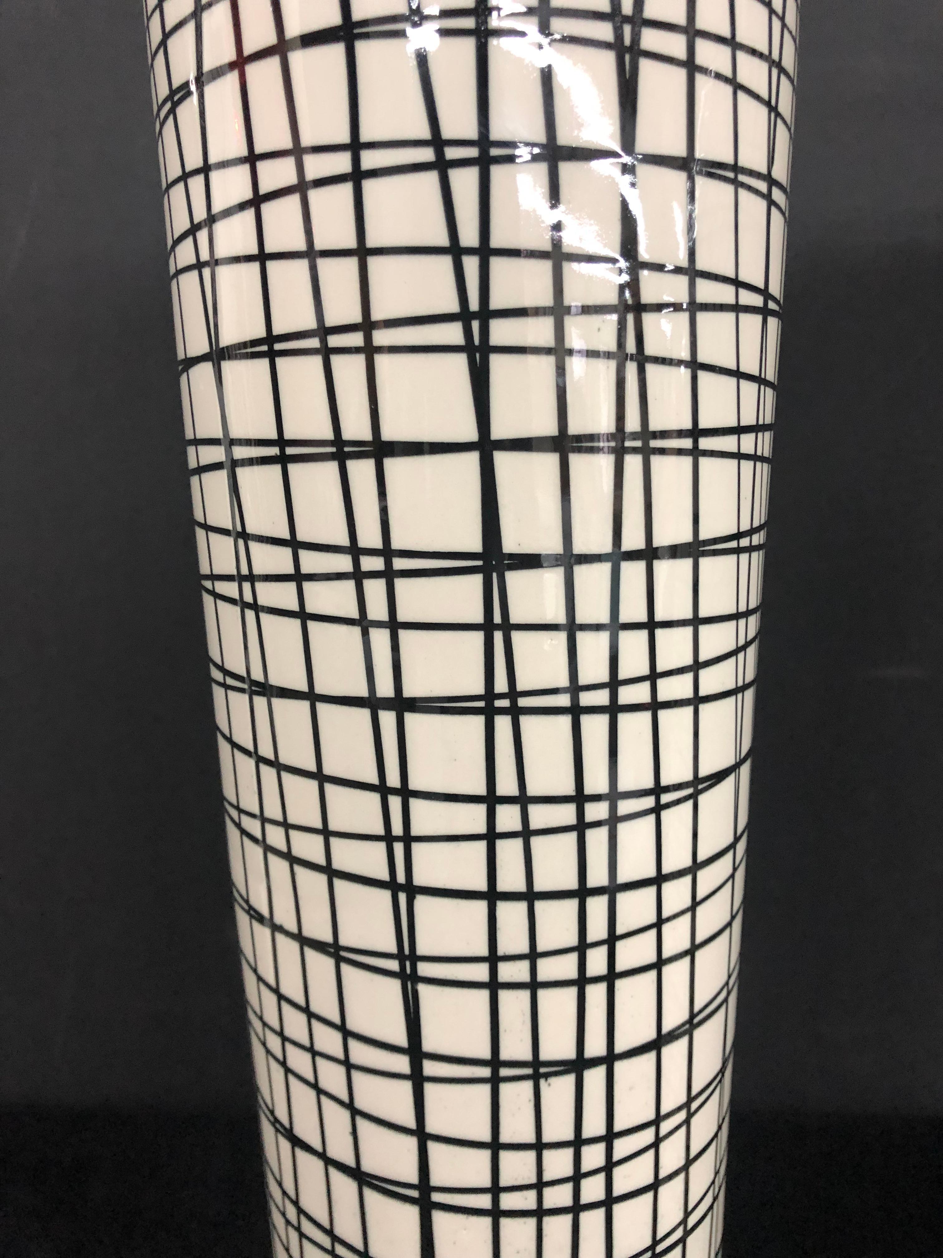 Unknown Pair of Tall Black and White Crosshatched Vases with Lamp Application