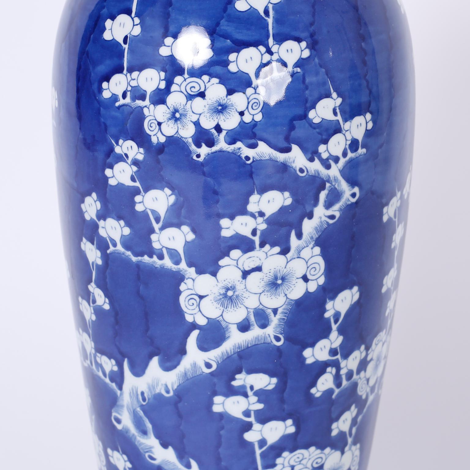 Chinoiserie Pair of Tall Blue and White Chinese Porcelain Jars or Urns