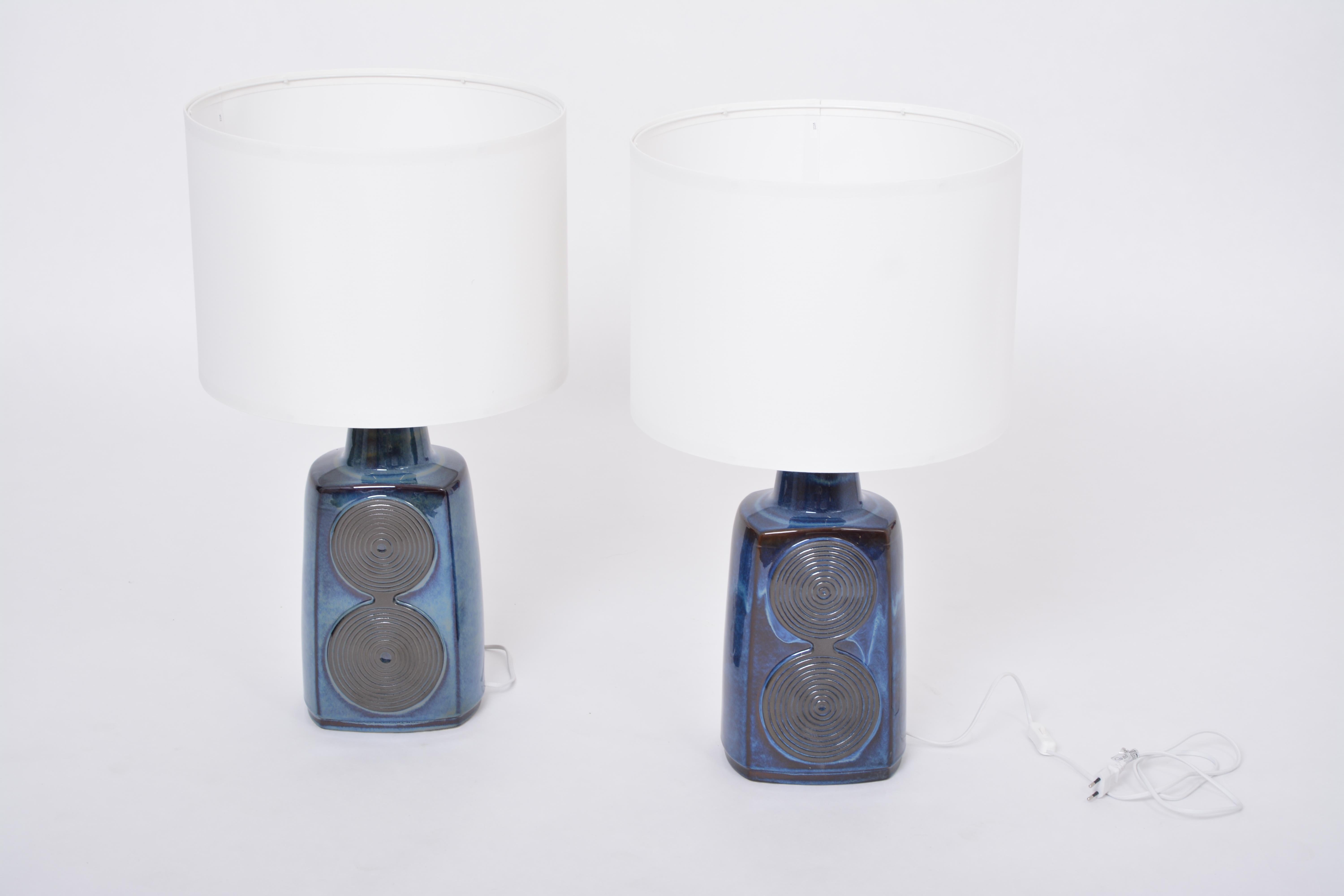 Pair of tall blue midcentury table lamps model 3461 by Einar Johansen for Soholm
These table lamps were originally vases that have been converted into spectacular and impressive table lamps. Einar Johansen designed these vases for Danish company