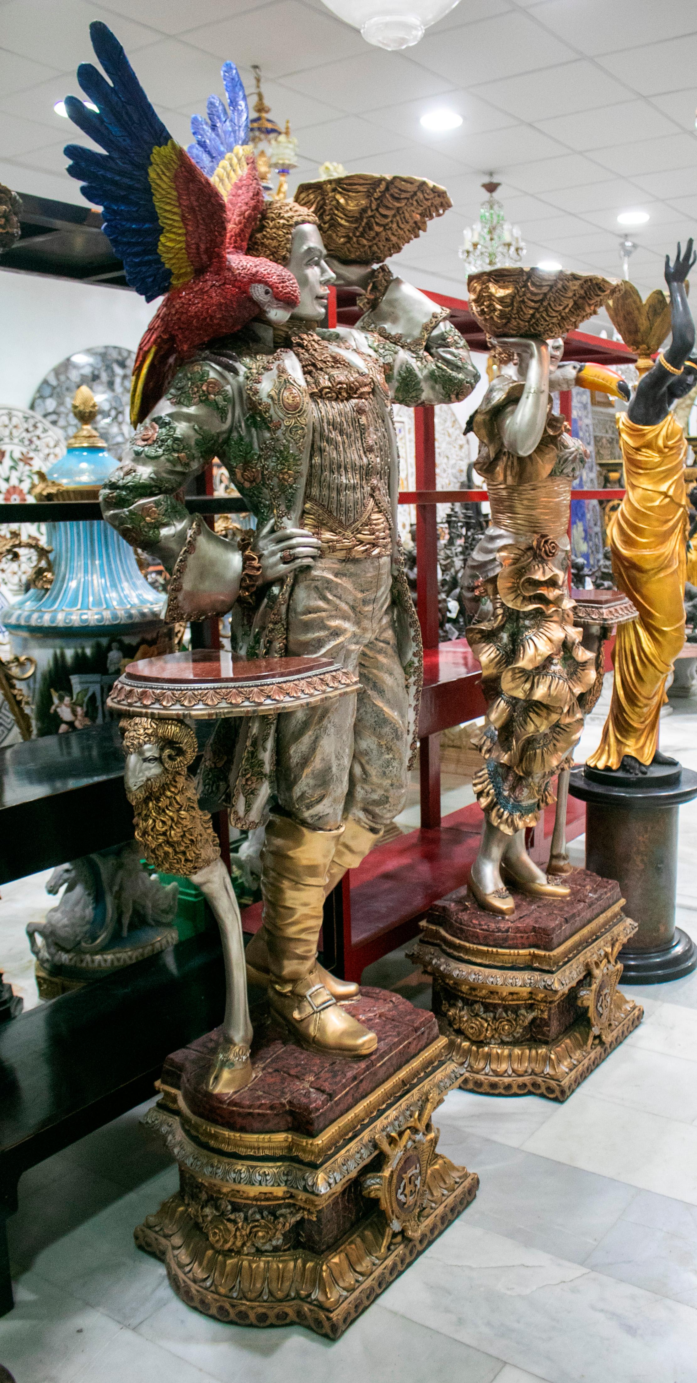 European Pair of Tall Bronze Lifesize Painted Venetian Sculptures with Birds and Conchs For Sale
