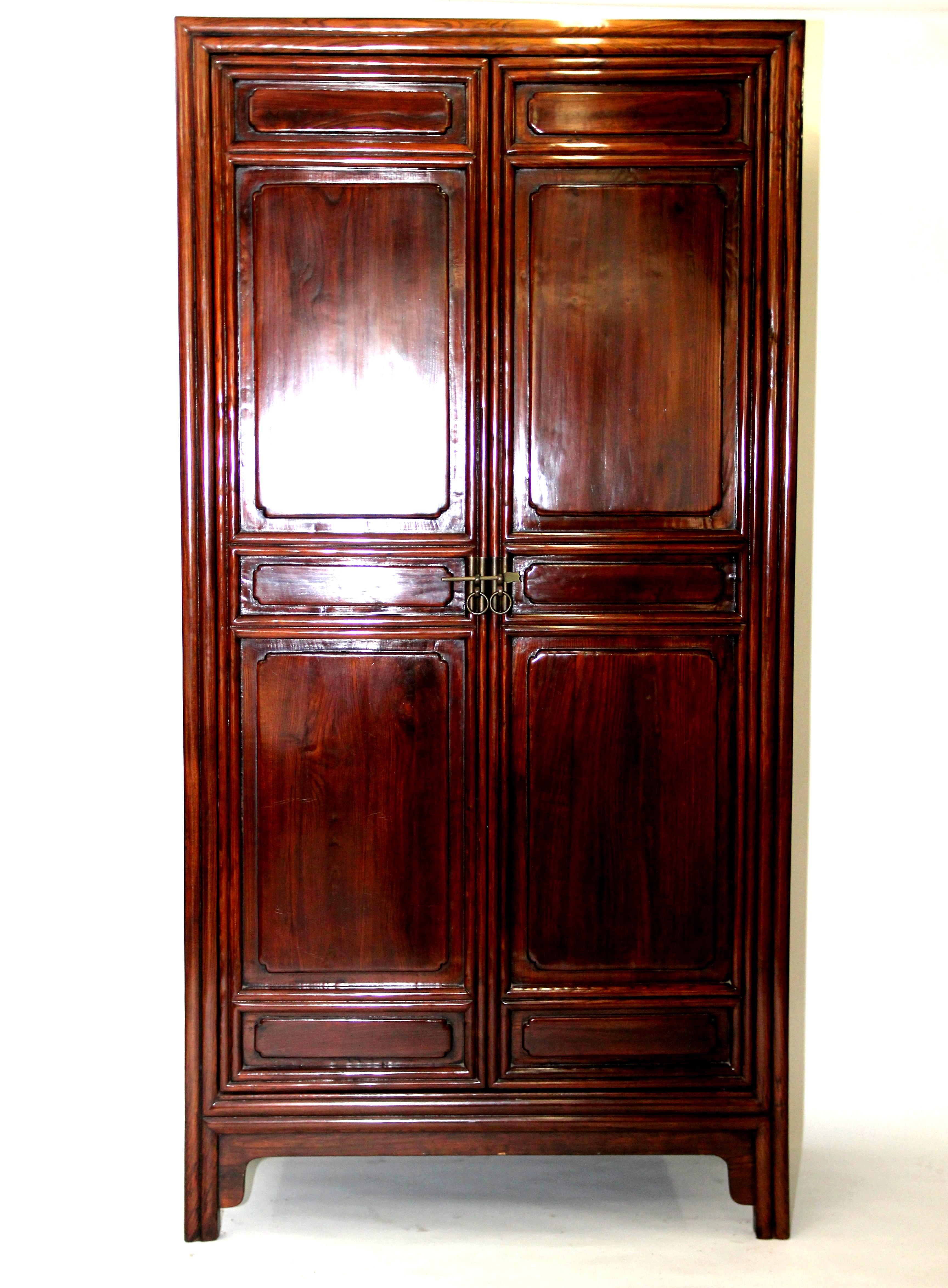 Chinese Pair of Tall Cabinets with Square Corners and Carved with Lipped Moulding For Sale