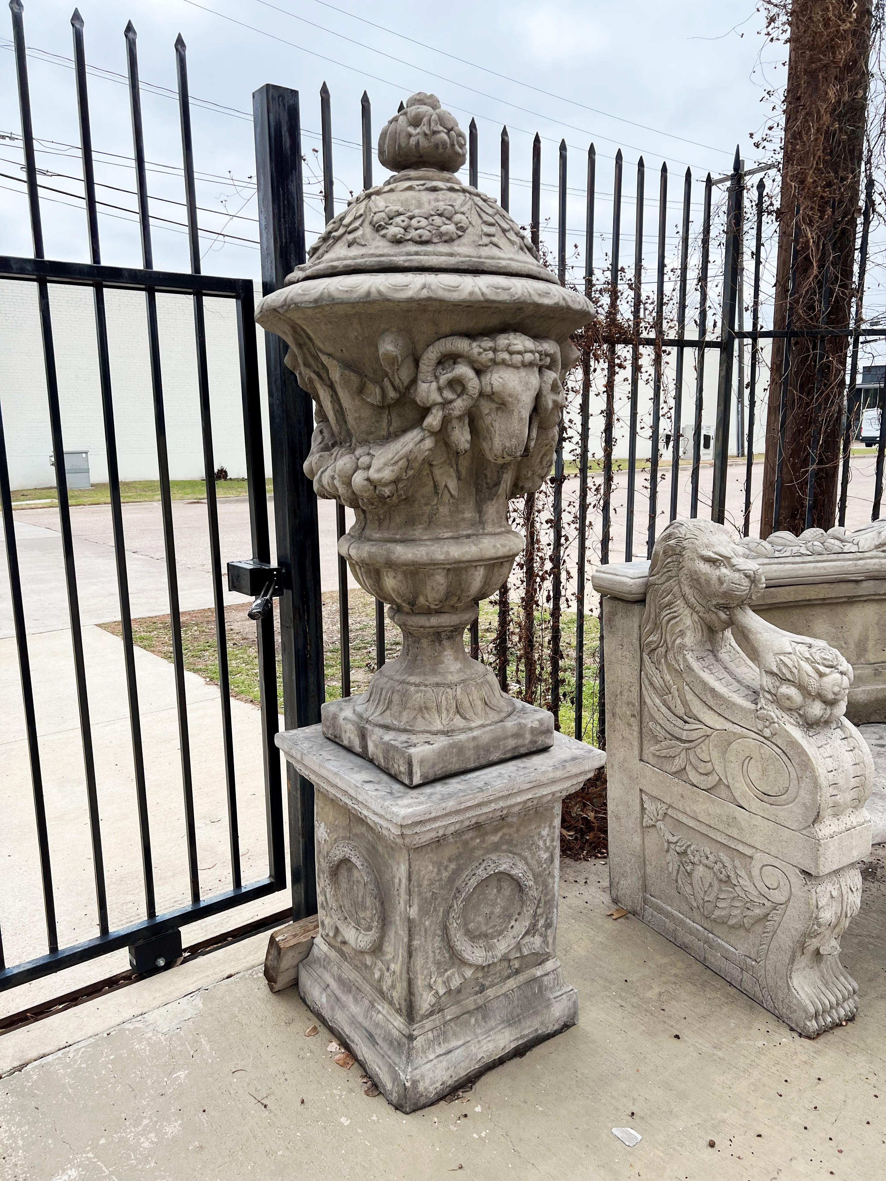 Pair of Tall Cast Garden Urns on Pedestals with Rams Heads and Swags In Good Condition In Dallas, TX