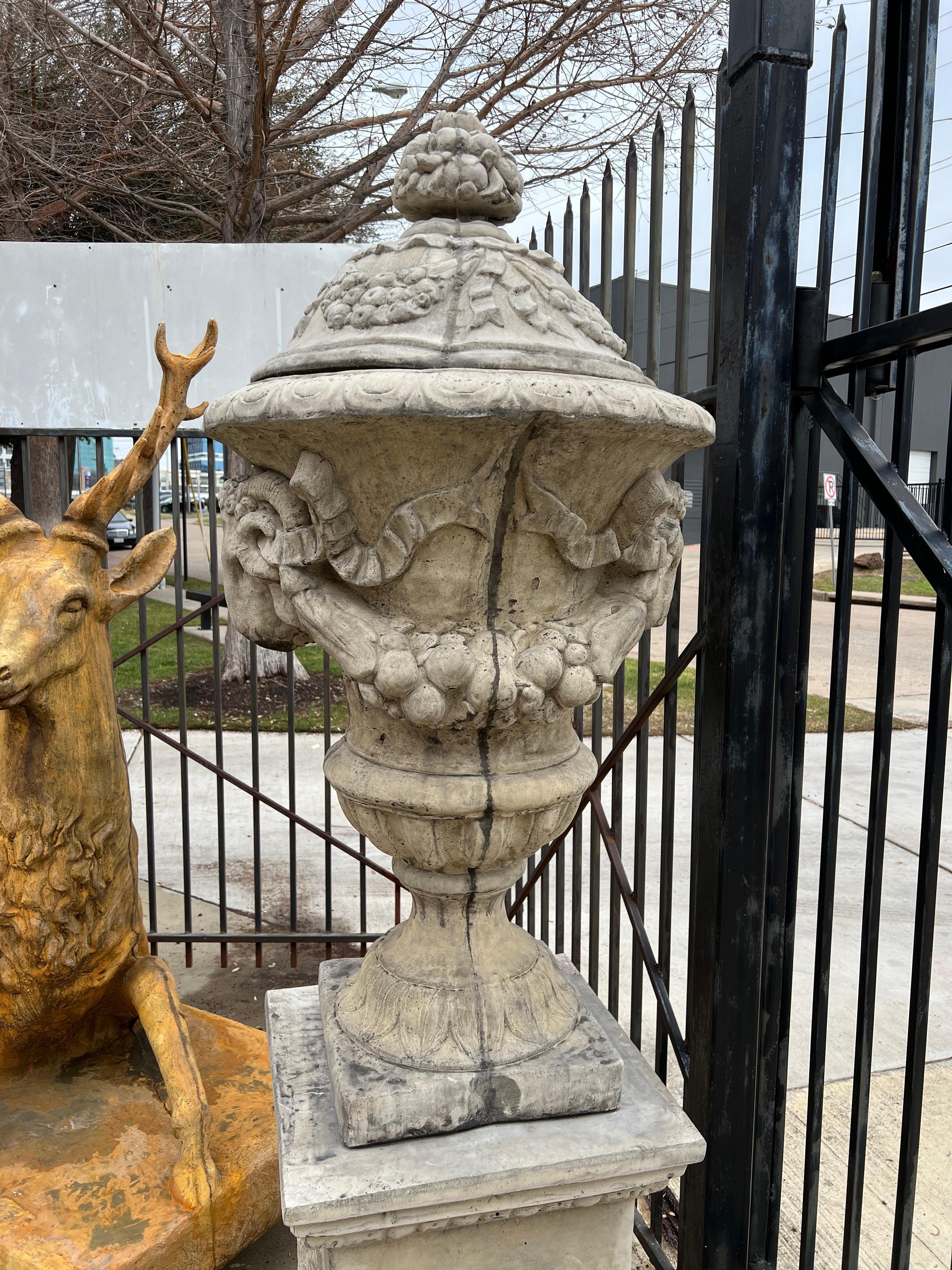 Contemporary Pair of Tall Cast Garden Urns on Pedestals with Rams Heads and Swags