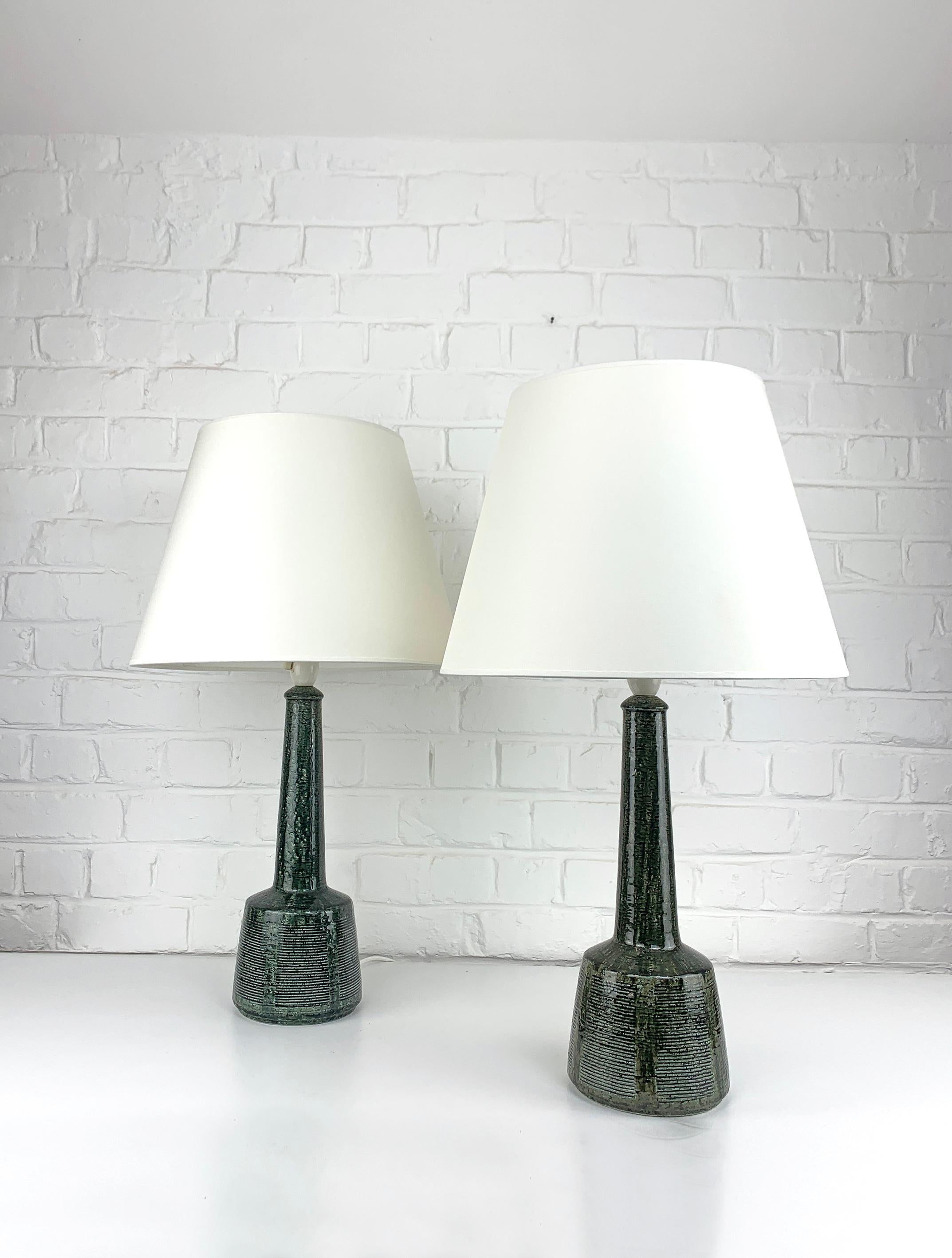 These lamps have been designed by Esben Klint, the son of Kaare Klint (the famous danish furniture designer). Esben has created a timeless design with this model, it has a contemporary and graphic side despite being over 50 years old.

These lamps