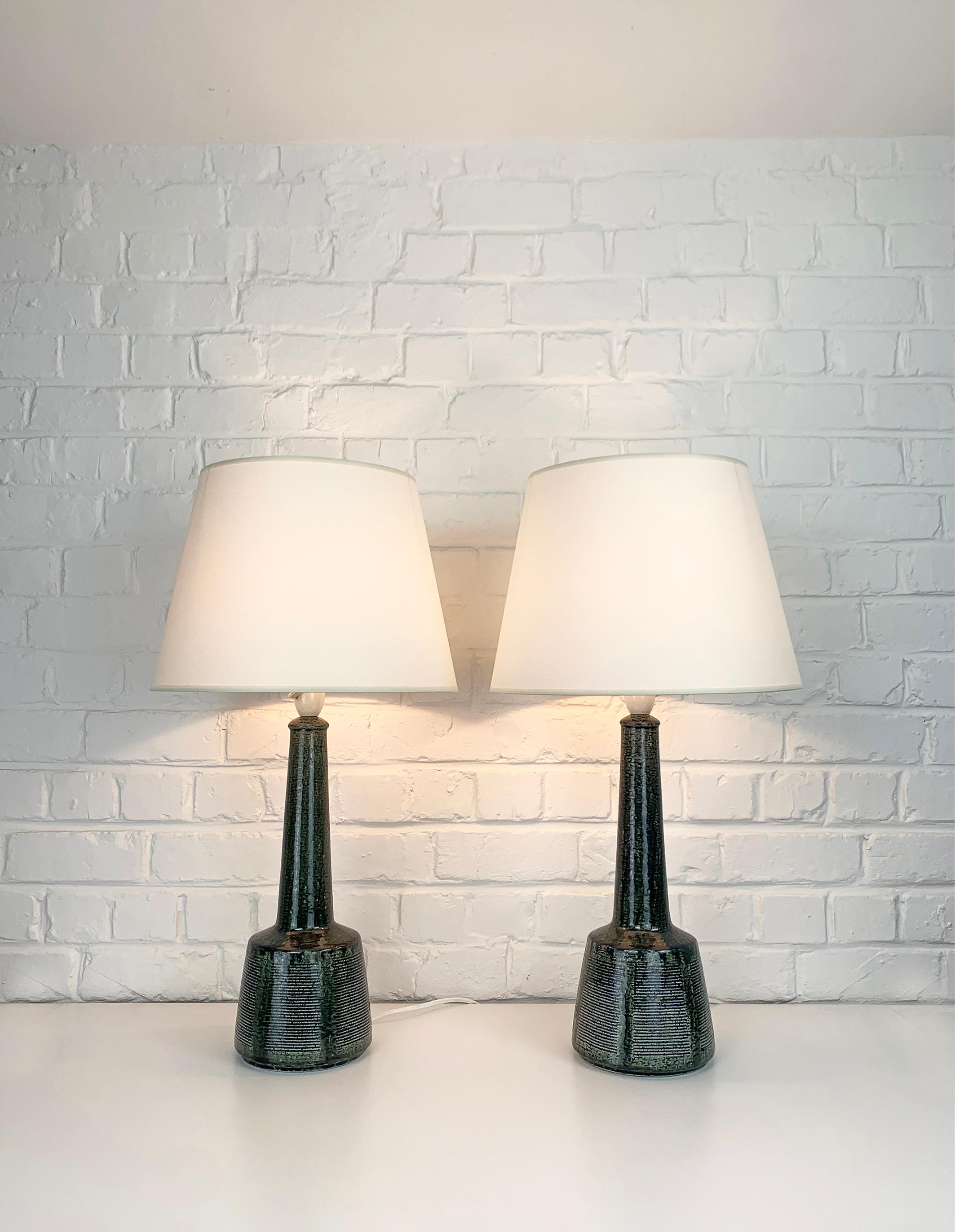These lamps have been designed by Esben Klint, son of Kaare Klint (the famous danish furniture designer). Esben has created a timeless design with this model, it has a contemporary and graphic side despite being over 50 years old.

These lamps have