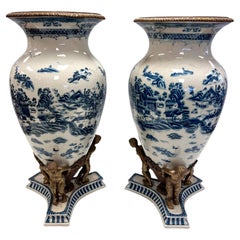 Vintage Pair of Tall Chinoiserie Blue and White Urns With Bronze Figural Mounts