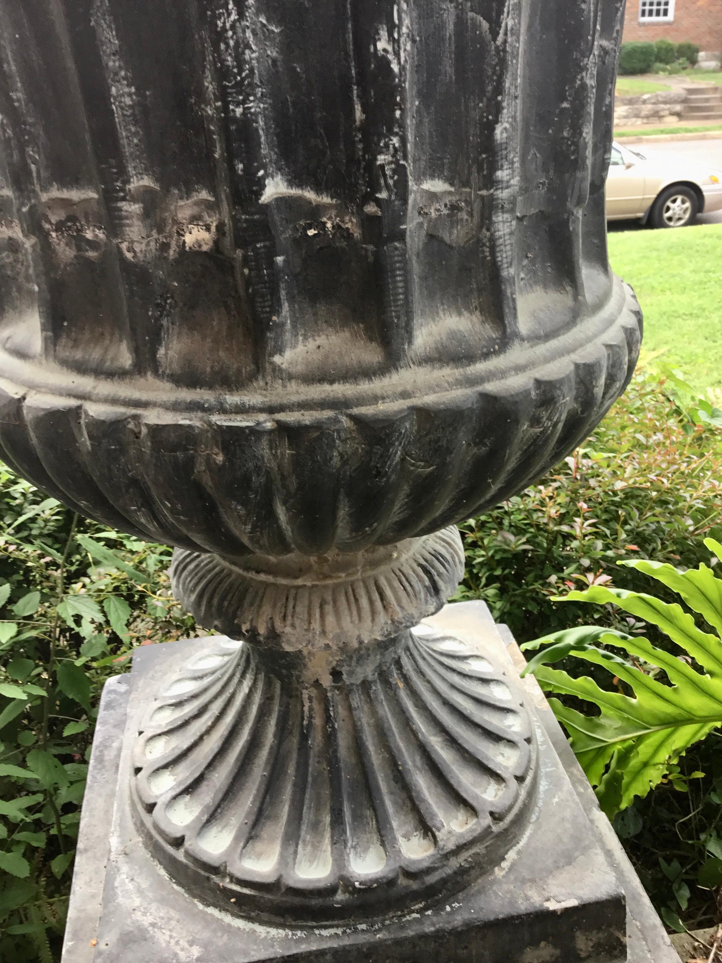 Classical Roman Pair of Tall Classical Styled Fluted Metal Garden Urns on Stands For Sale