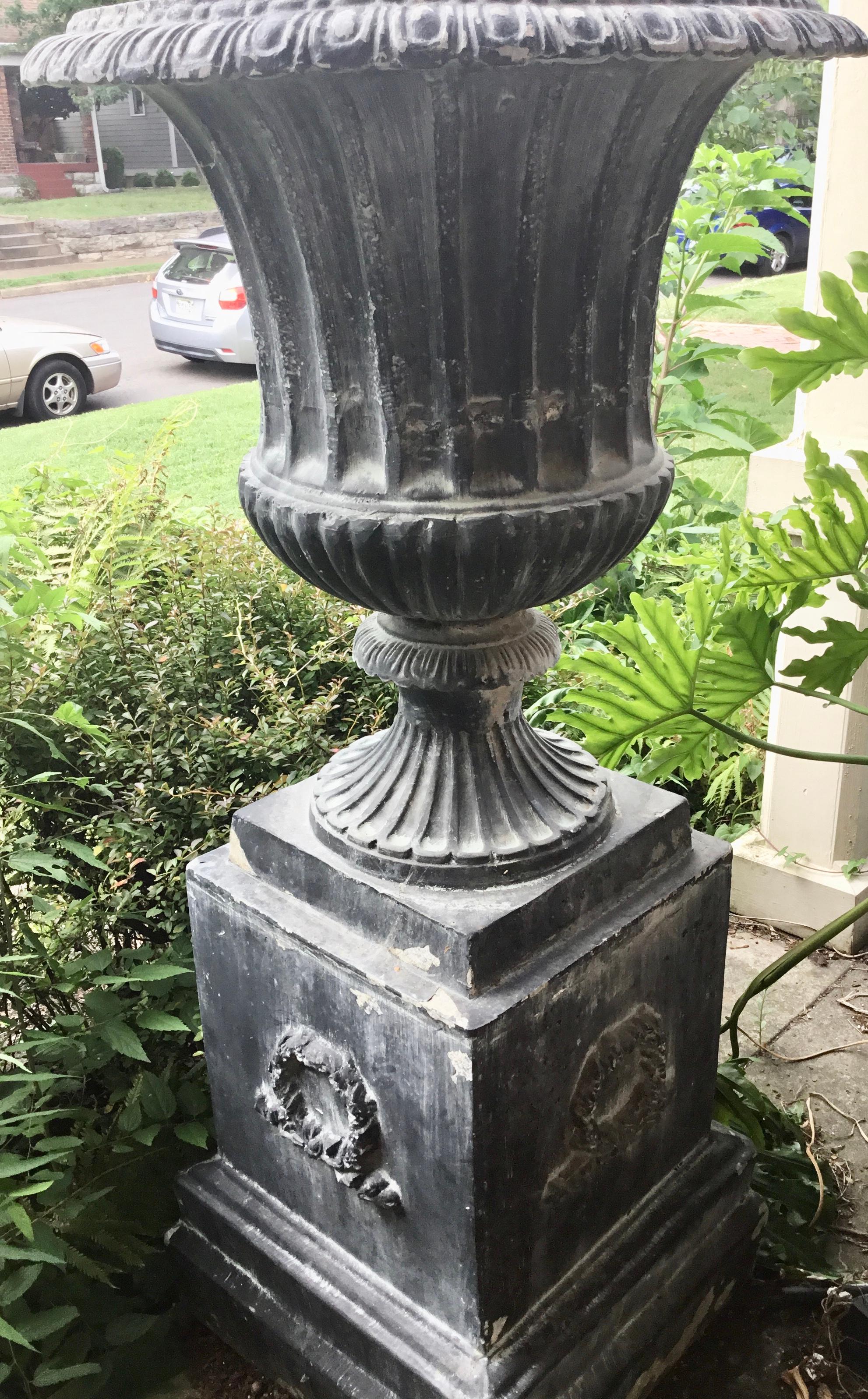 Unknown Pair of Tall Classical Styled Fluted Metal Garden Urns on Stands For Sale