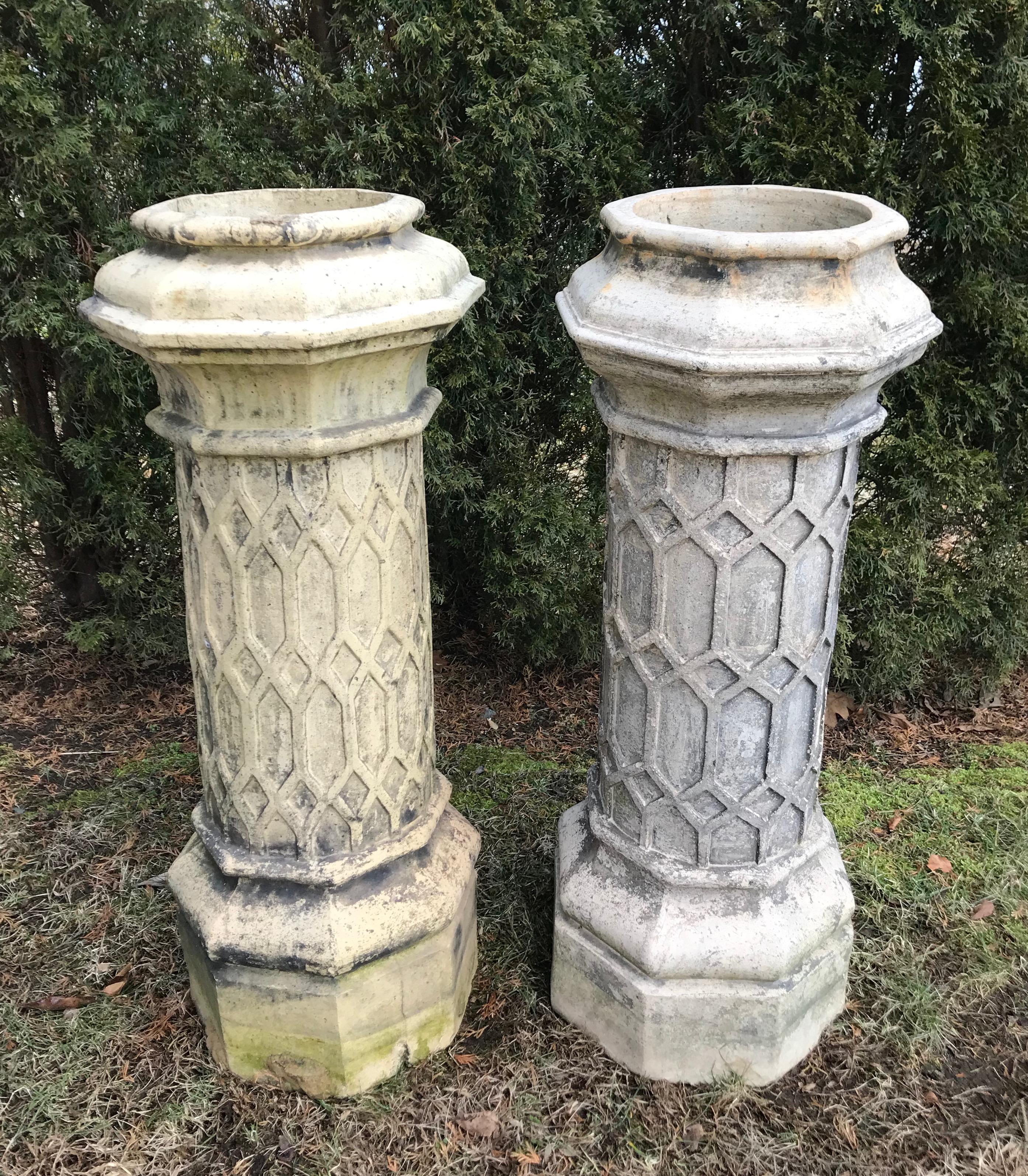 This stunning pair of tall chimney pots with outstanding hexagonal decoration was sourced from a fine Norfolk country manor and are the perfect receptacles for large, effusive flowering pots. Although unsigned, they are reliably attributed to
