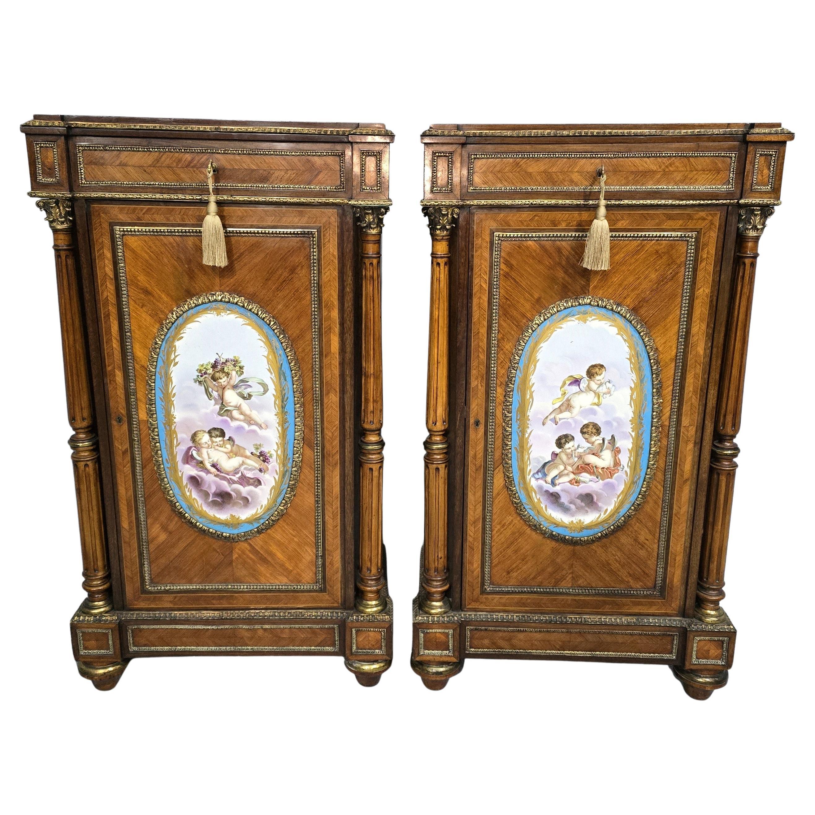 Pair of Tall French Louis XVI  Porcelain Mounted Cabinets
