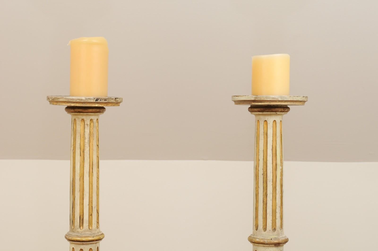 tall wooden candlesticks