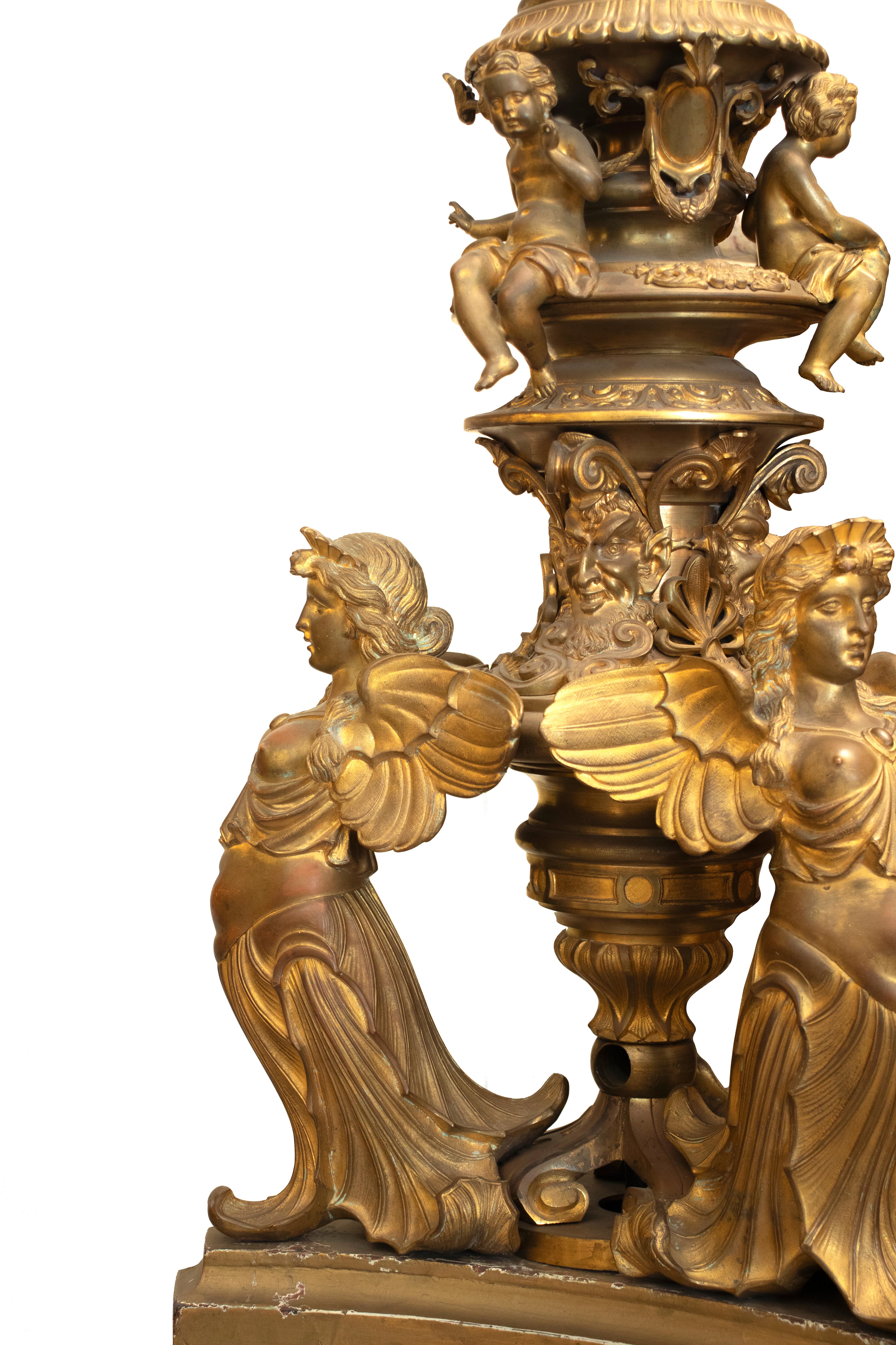 Neoclassical Revival Pair of Tall Gilt Bronze 8-light Torcheres Decorated with Figurines For Sale