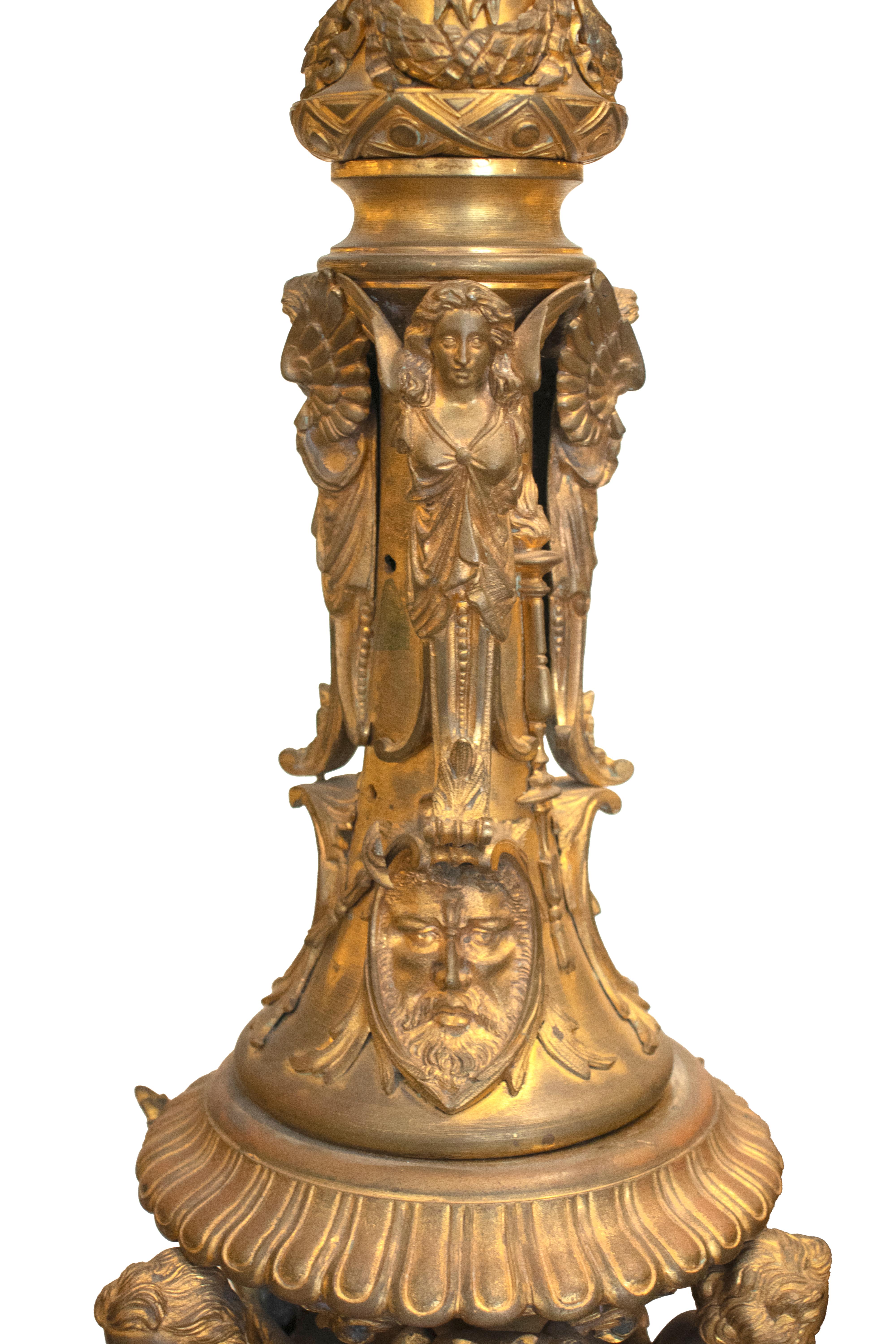 Pair of Tall Gilt Bronze 8-light Torcheres Decorated with Figurines In Good Condition For Sale In Dubai, AE