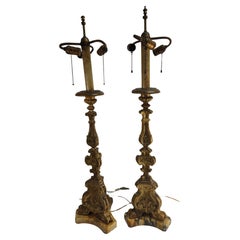 Pair of Tall Italian Carved Giltwood Prickett Table Lamps with Marble Plinths 