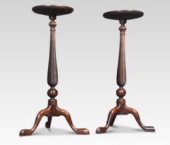 Pair of tall mahogany lamp tables